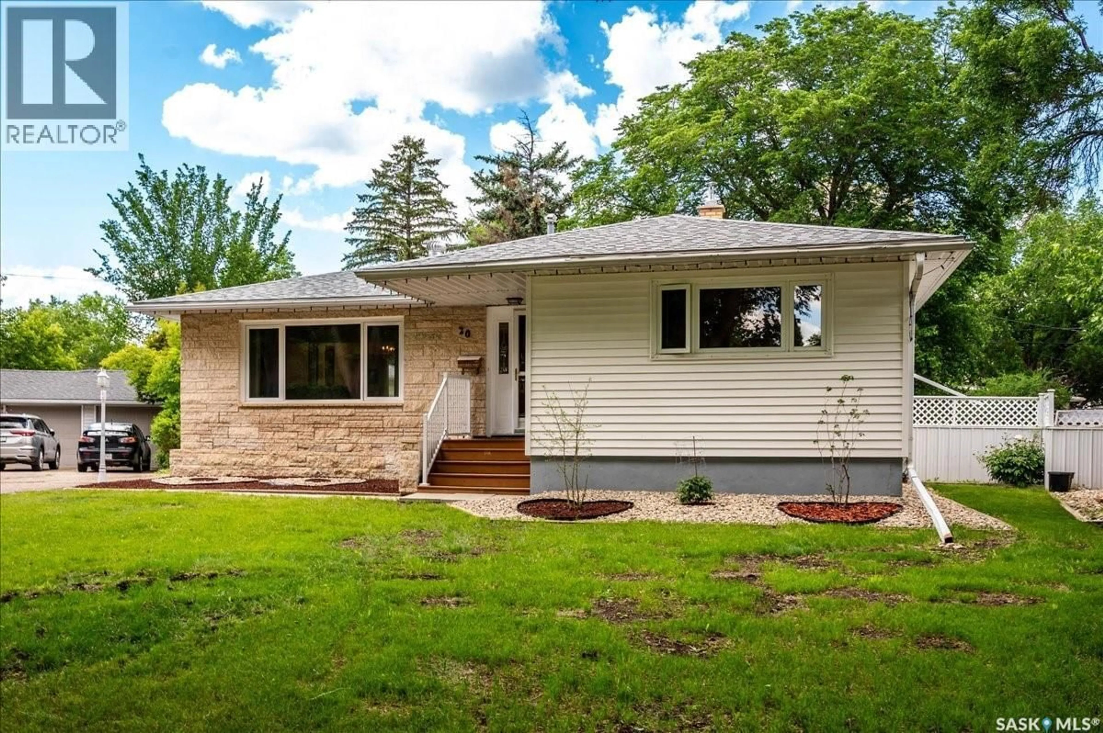 Home with vinyl exterior material, street for 20 DUNNING CRESCENT, Regina Saskatchewan S4S3W1
