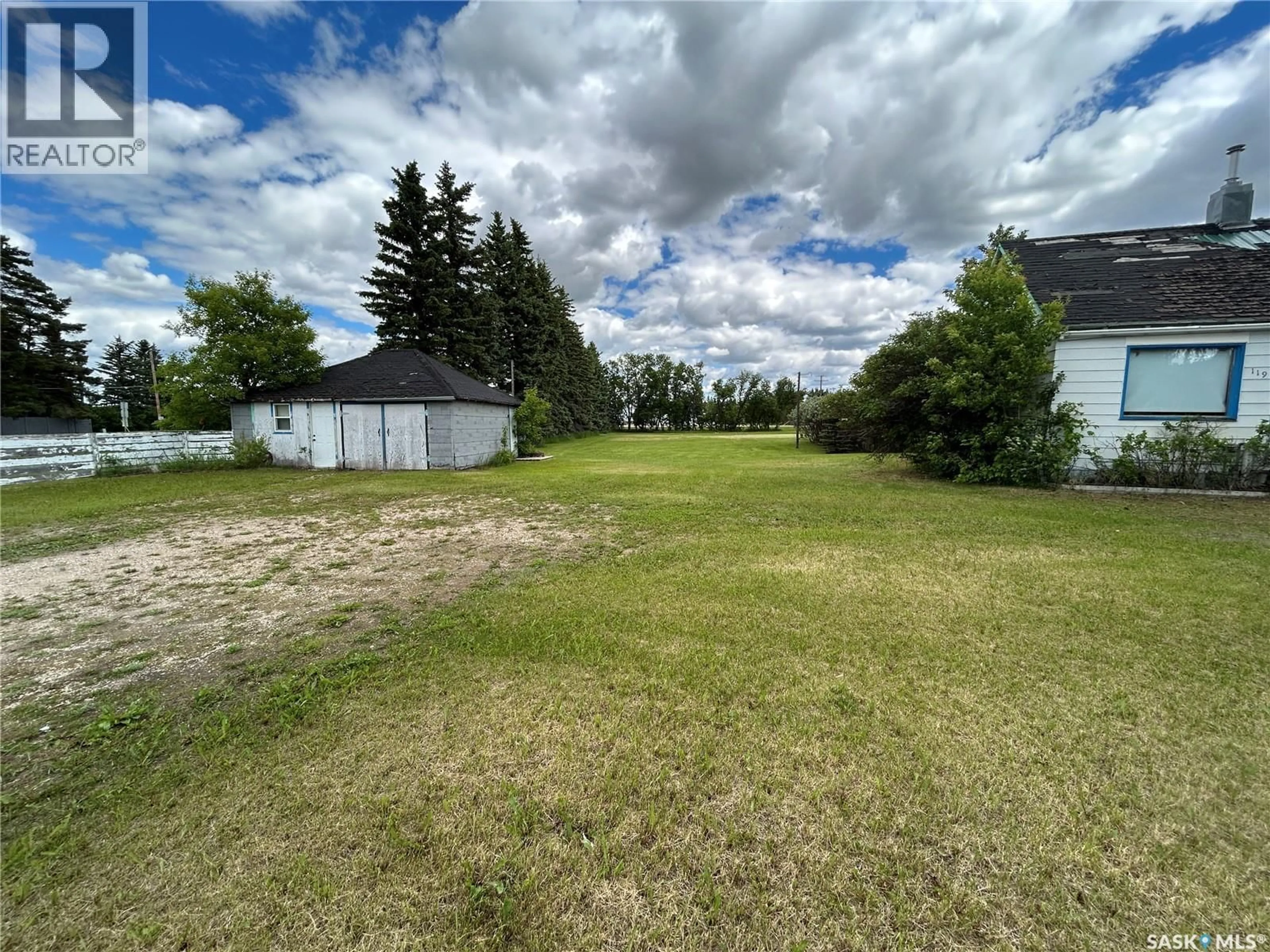 A pic from outside/outdoor area/front of a property/back of a property/a pic from drone, unknown for 119 MAIN STREET, Lanigan Saskatchewan S0K2M0