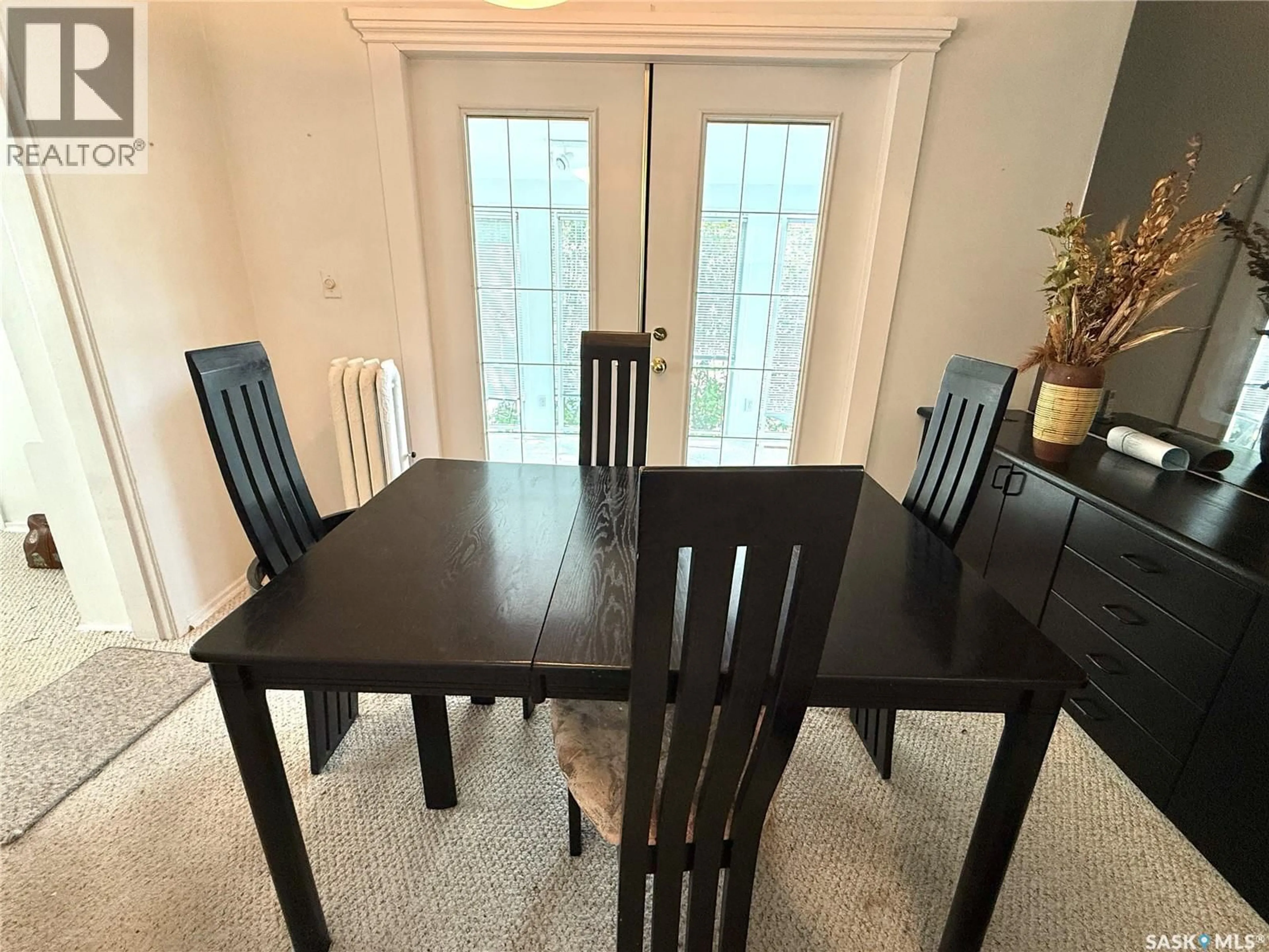 Dining room, wood/laminate floor for 1351 101ST STREET, North Battleford Saskatchewan S9A0Z9