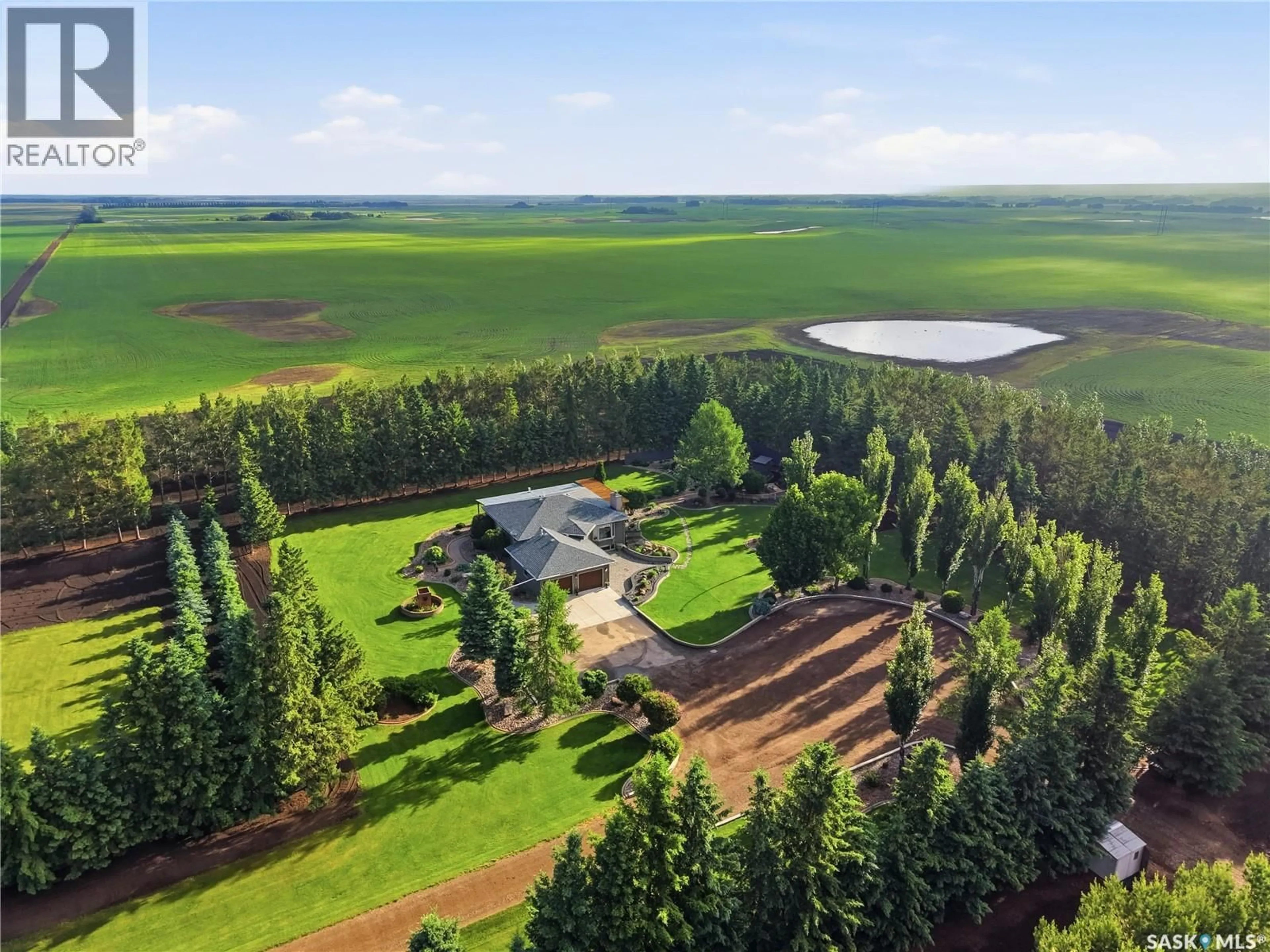 A pic from outside/outdoor area/front of a property/back of a property/a pic from drone, forest/trees view for HEIDEL ACREAGE, North Battleford Rm No. 437 Saskatchewan S9A3W2