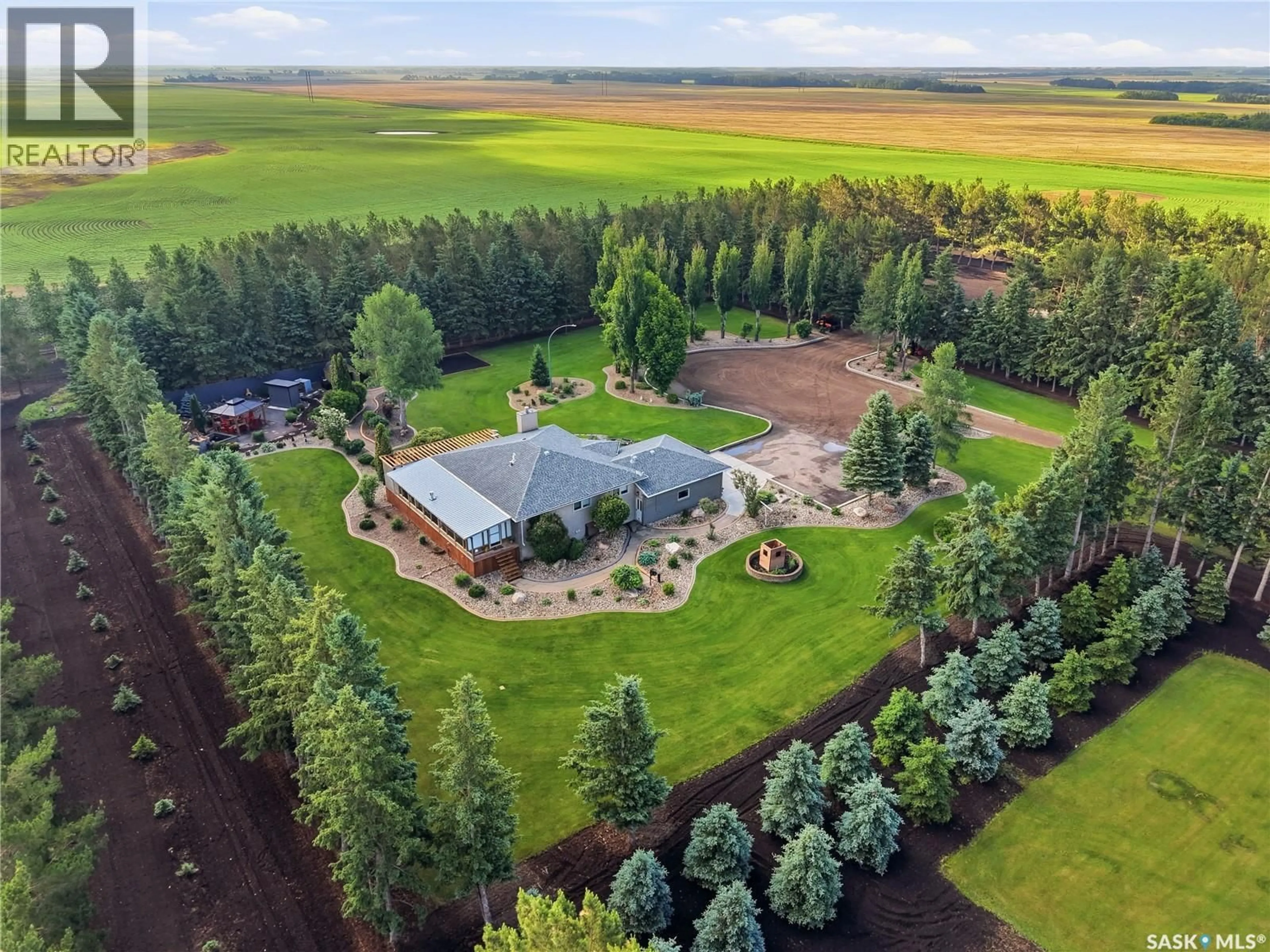 A pic from outside/outdoor area/front of a property/back of a property/a pic from drone, forest/trees view for HEIDEL ACREAGE, North Battleford Rm No. 437 Saskatchewan S9A3W2