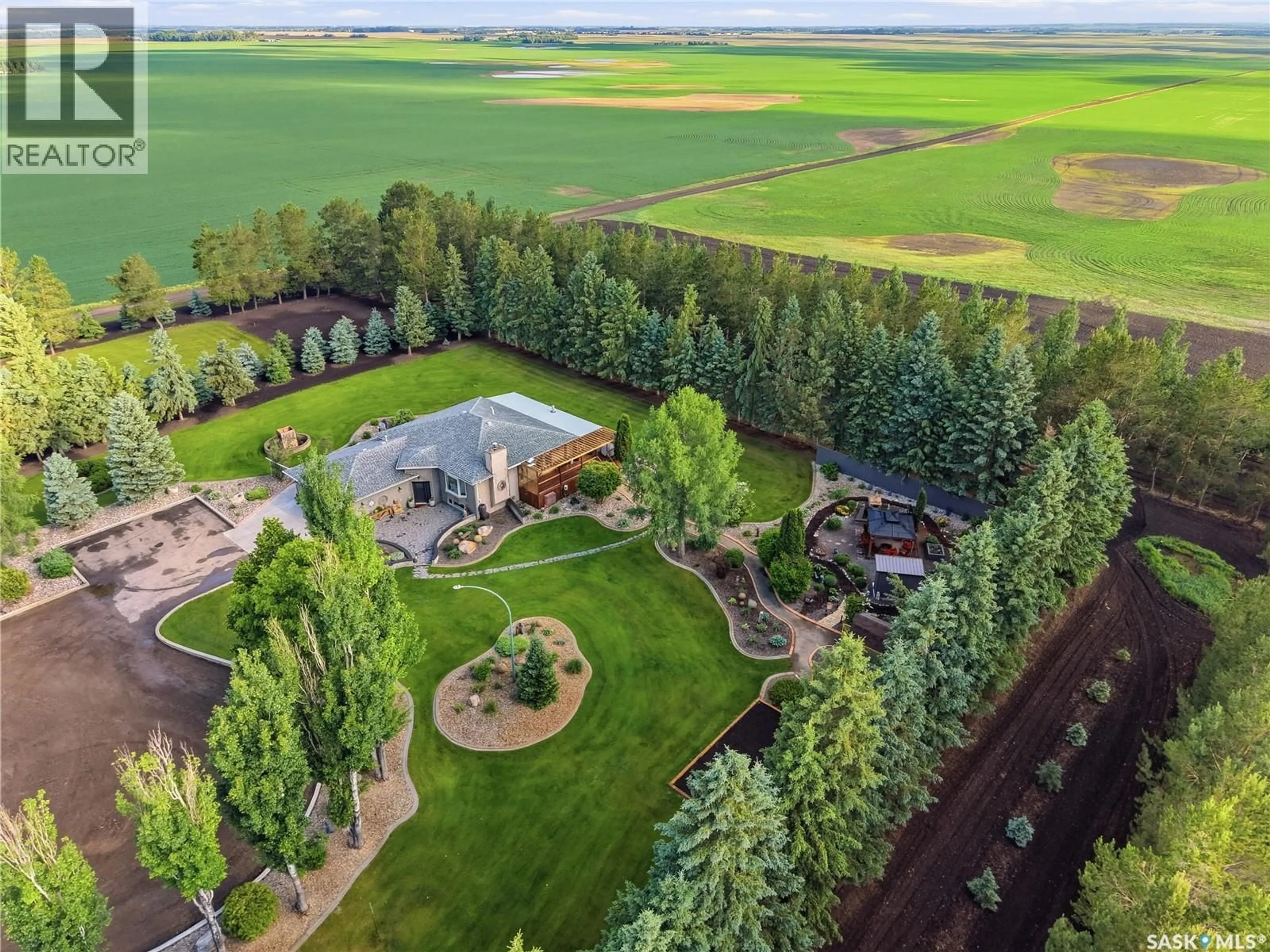 A pic from outside/outdoor area/front of a property/back of a property/a pic from drone, mountain view for HEIDEL ACREAGE, North Battleford Rm No. 437 Saskatchewan S9A3W2