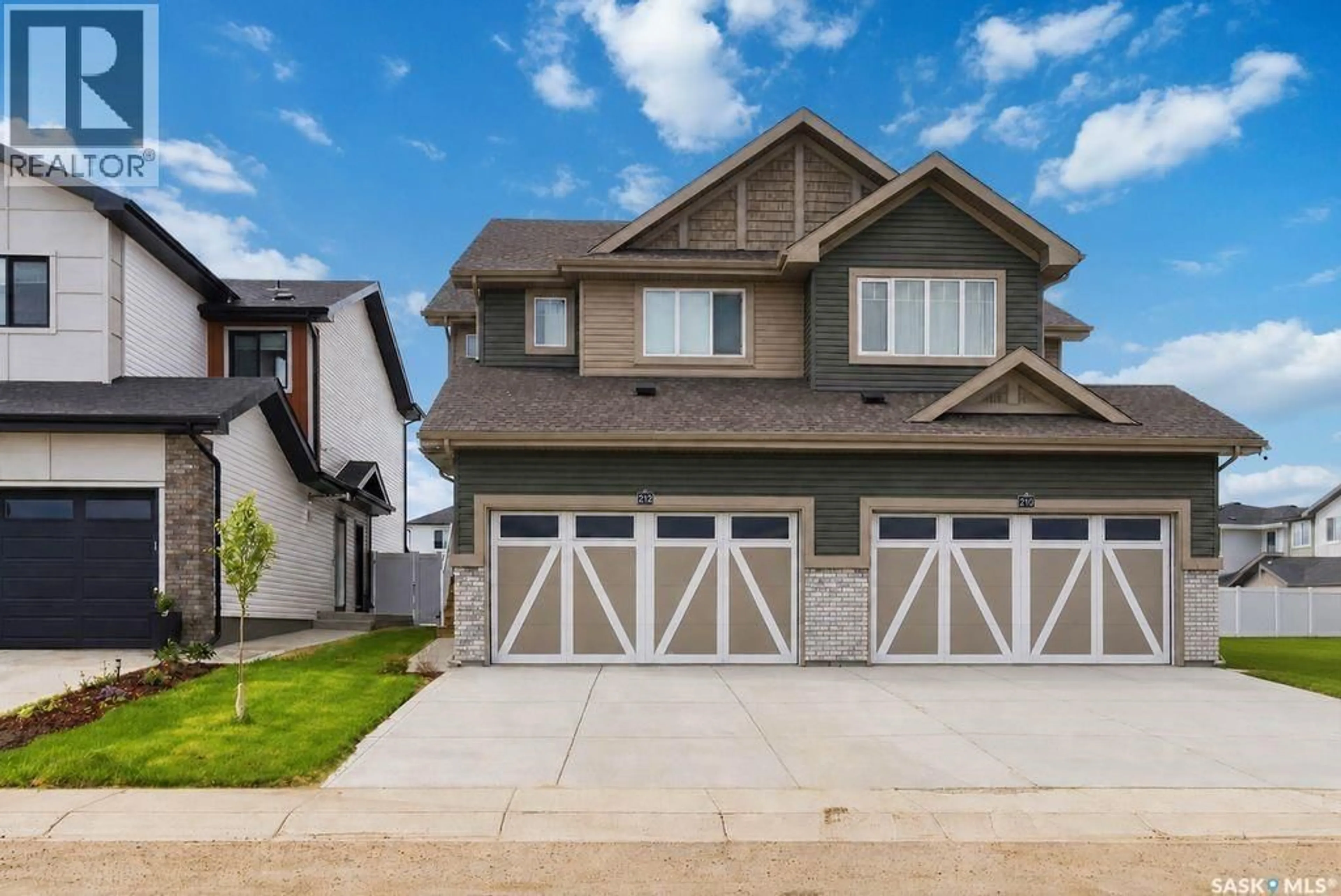 Home with vinyl exterior material, street for 212 MYLES HEIDT LANE, Saskatoon Saskatchewan S7W1J1