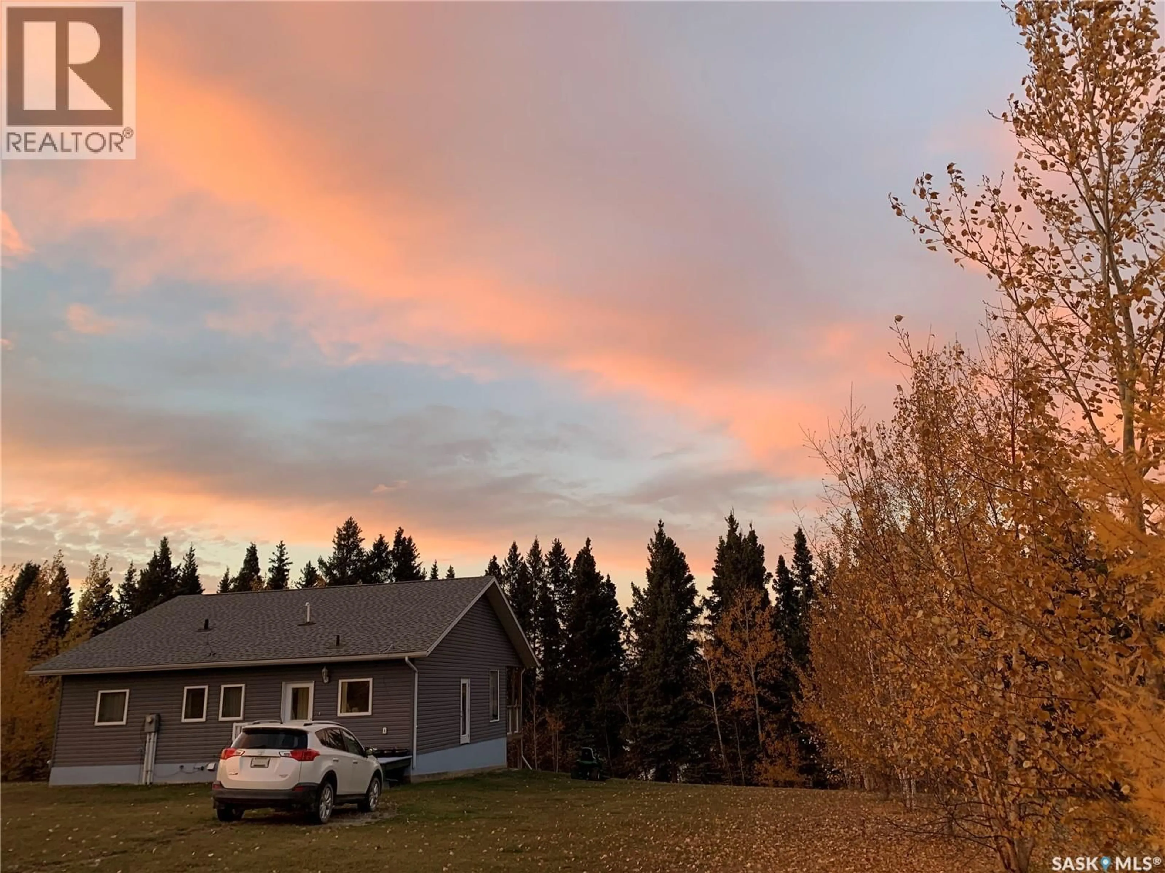 A pic from outside/outdoor area/front of a property/back of a property/a pic from drone, mountain view for 13 JENSEN BAY, Fish Lake Saskatchewan S0J0K0