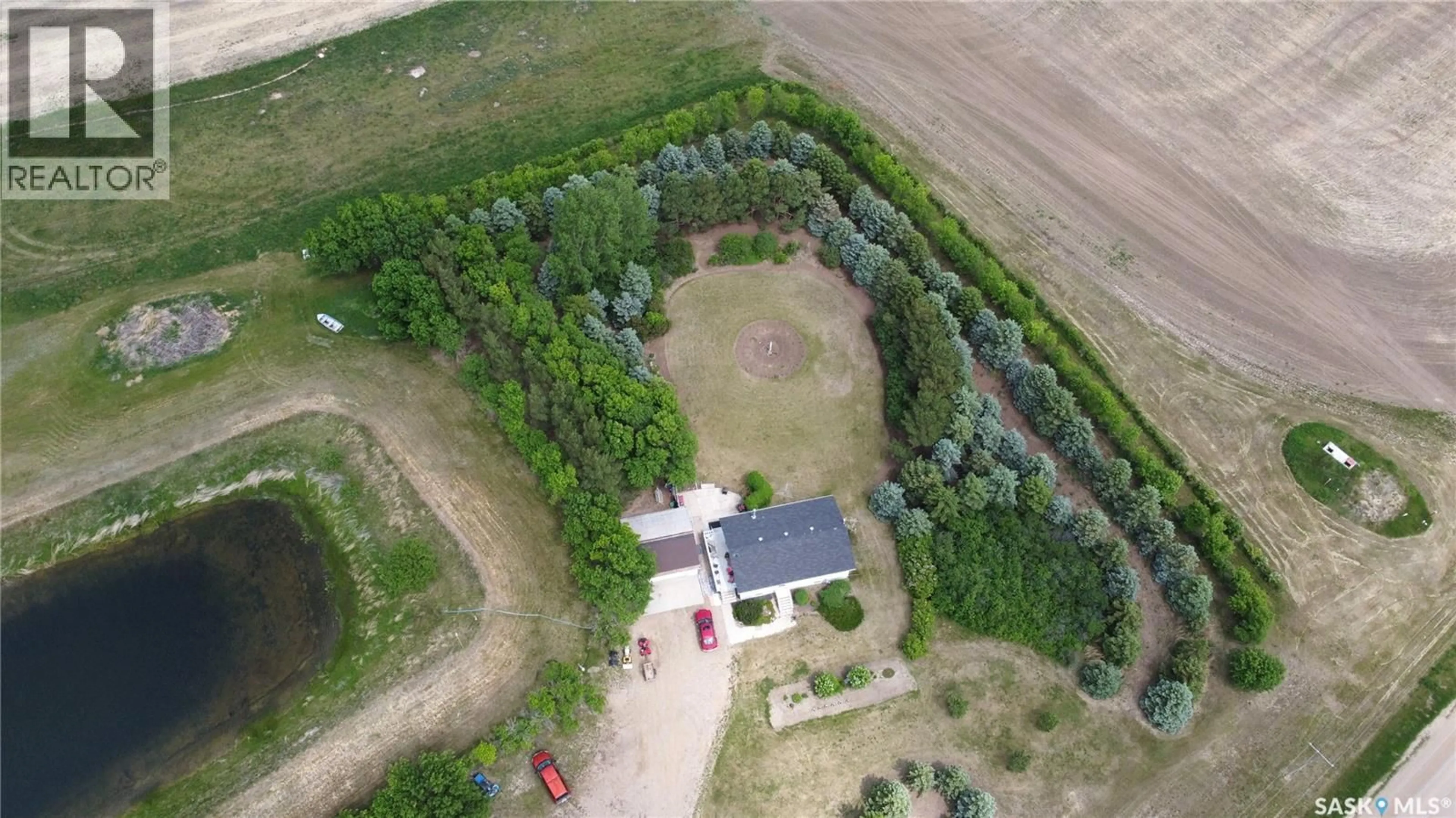 A pic from outside/outdoor area/front of a property/back of a property/a pic from drone, building for TULLIS ACREAGE, Coteau Rm No. 255 Saskatchewan S0L1Z0