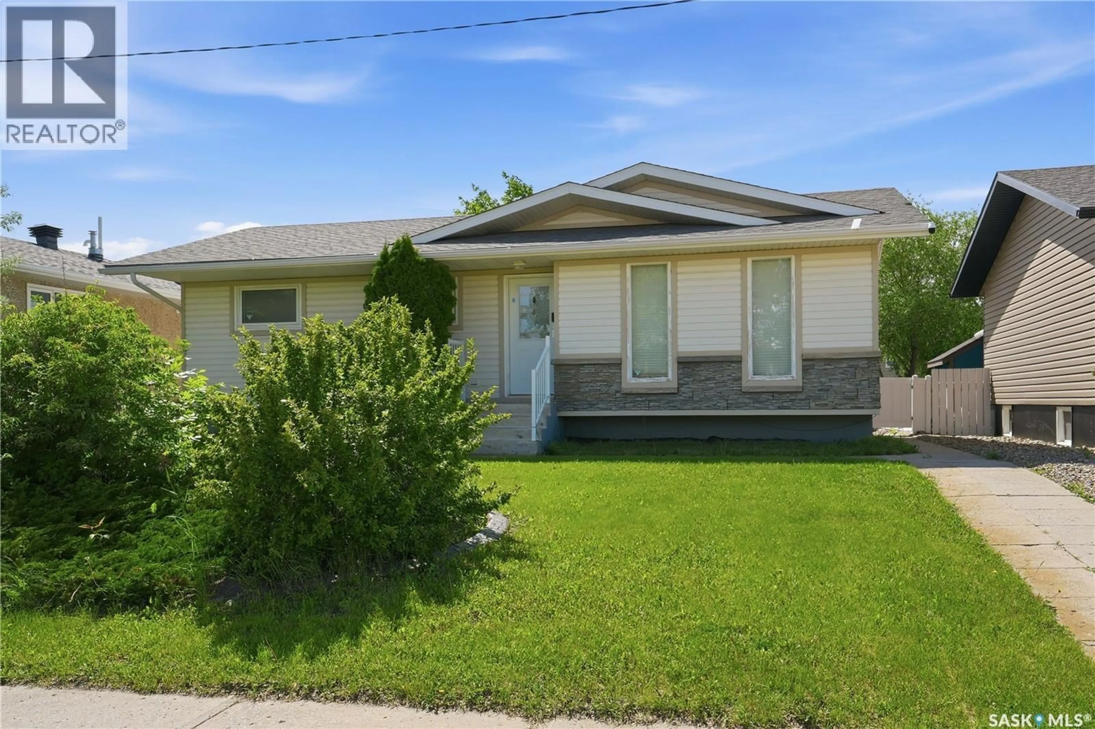 Home with vinyl exterior material, street for 2011 102ND STREET, North Battleford Saskatchewan S9A1H8
