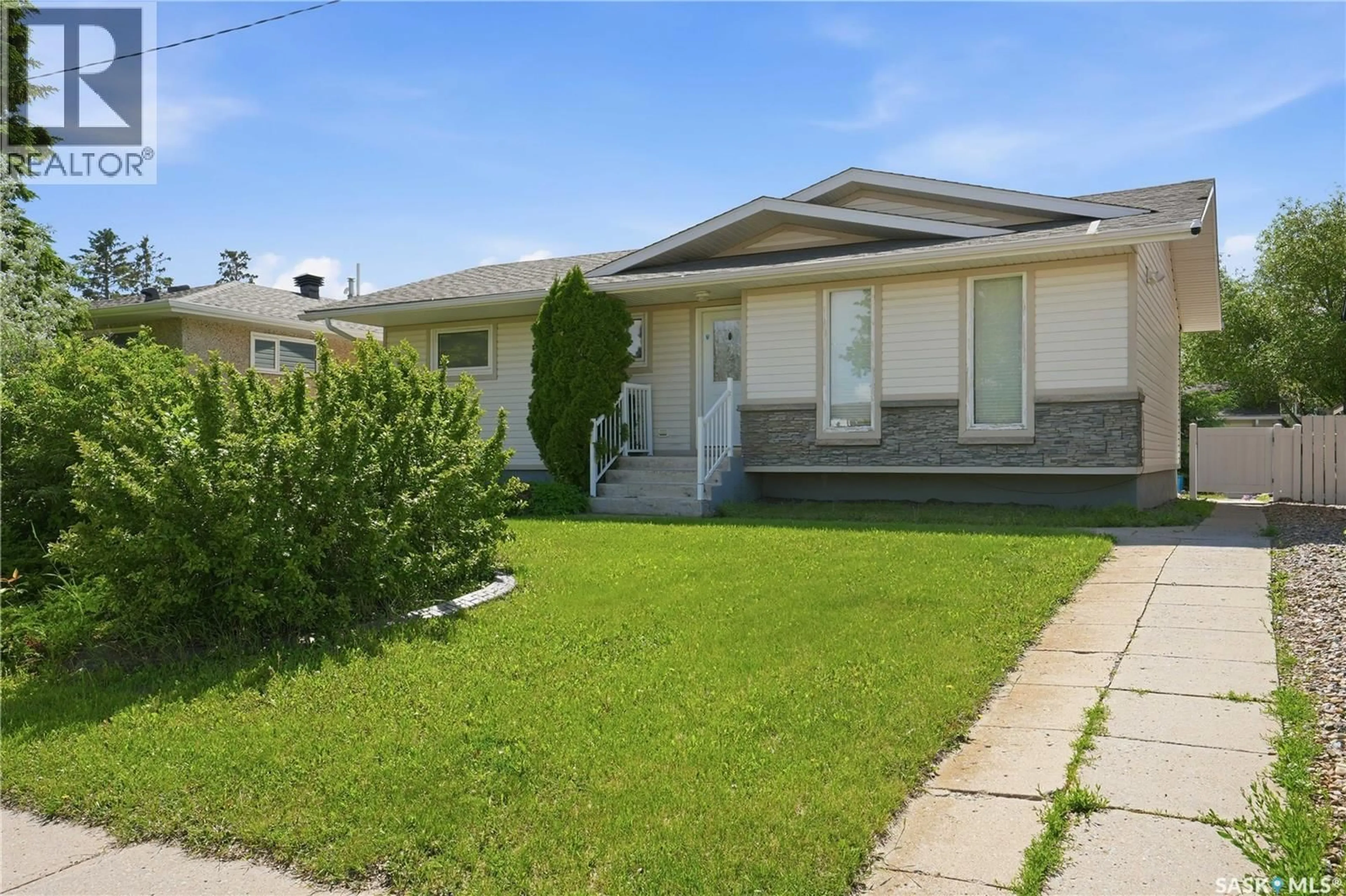 Home with vinyl exterior material, street for 2011 102ND STREET, North Battleford Saskatchewan S9A1H8