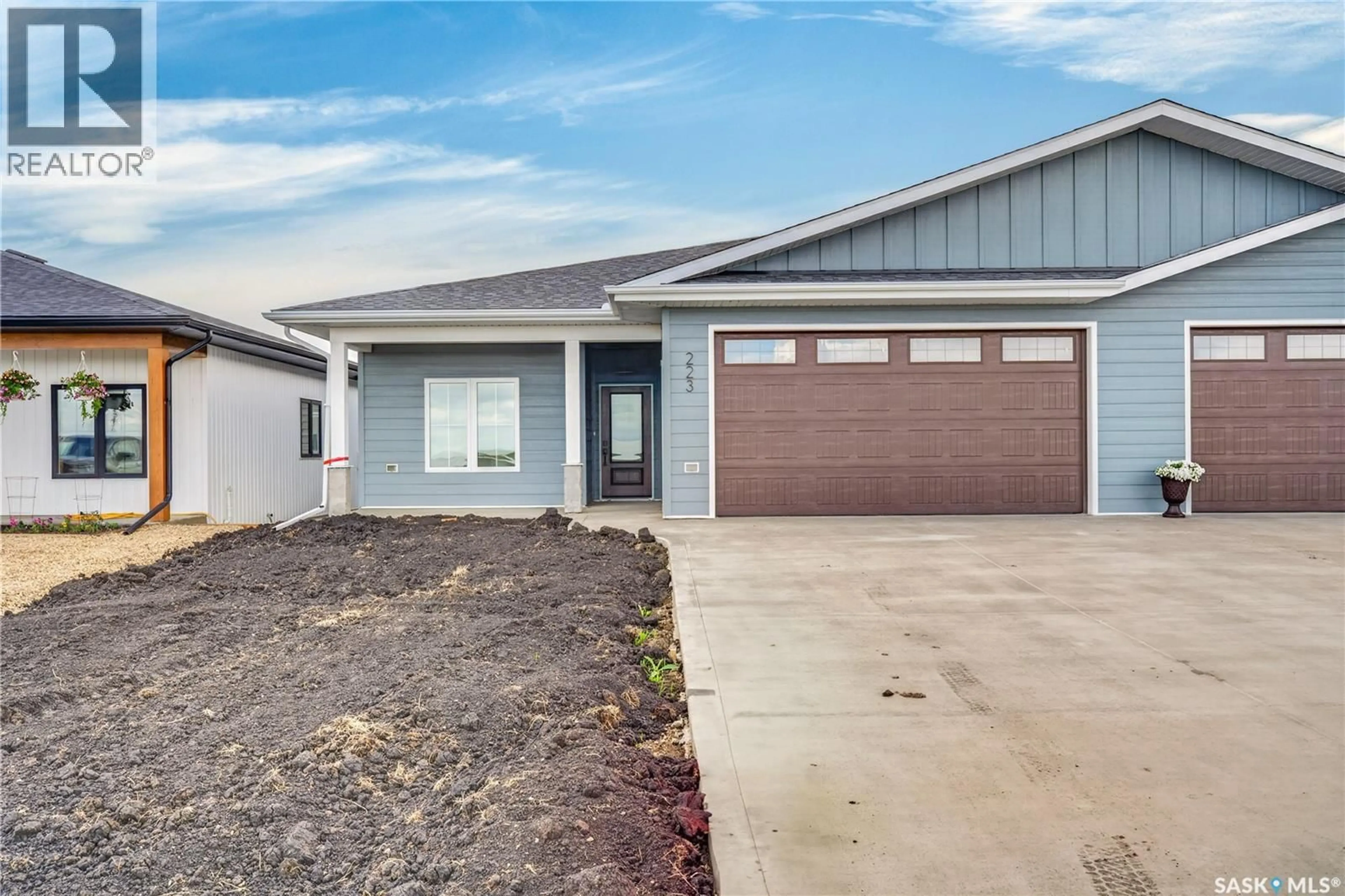 Home with vinyl exterior material, street for 223 BABINGTON AVENUE, Melfort Saskatchewan S0E1A0