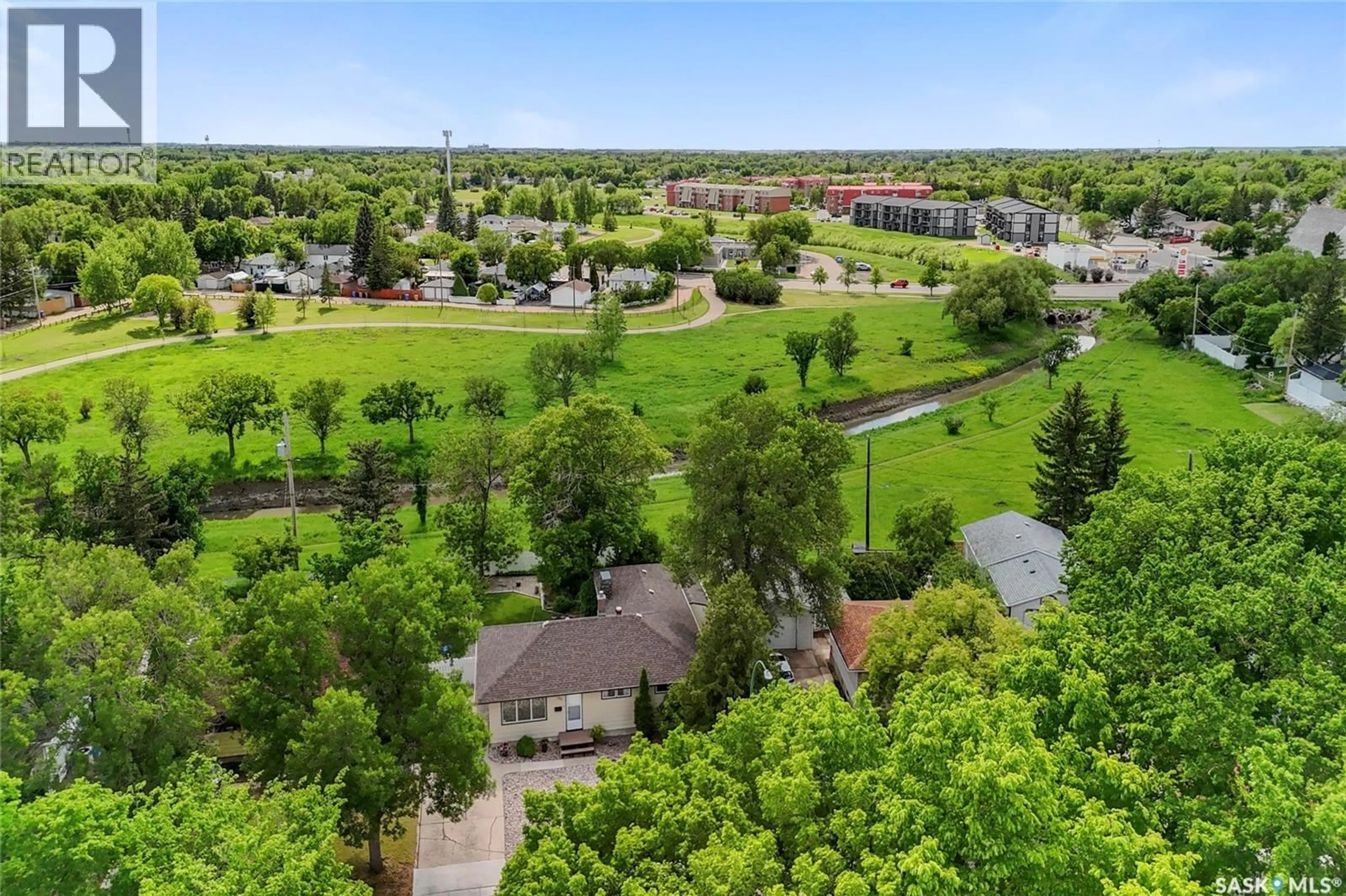 A pic from outside/outdoor area/front of a property/back of a property/a pic from drone, water/lake/river/ocean view for 133 ELLISON CRESCENT, Regina Saskatchewan S4R4V6