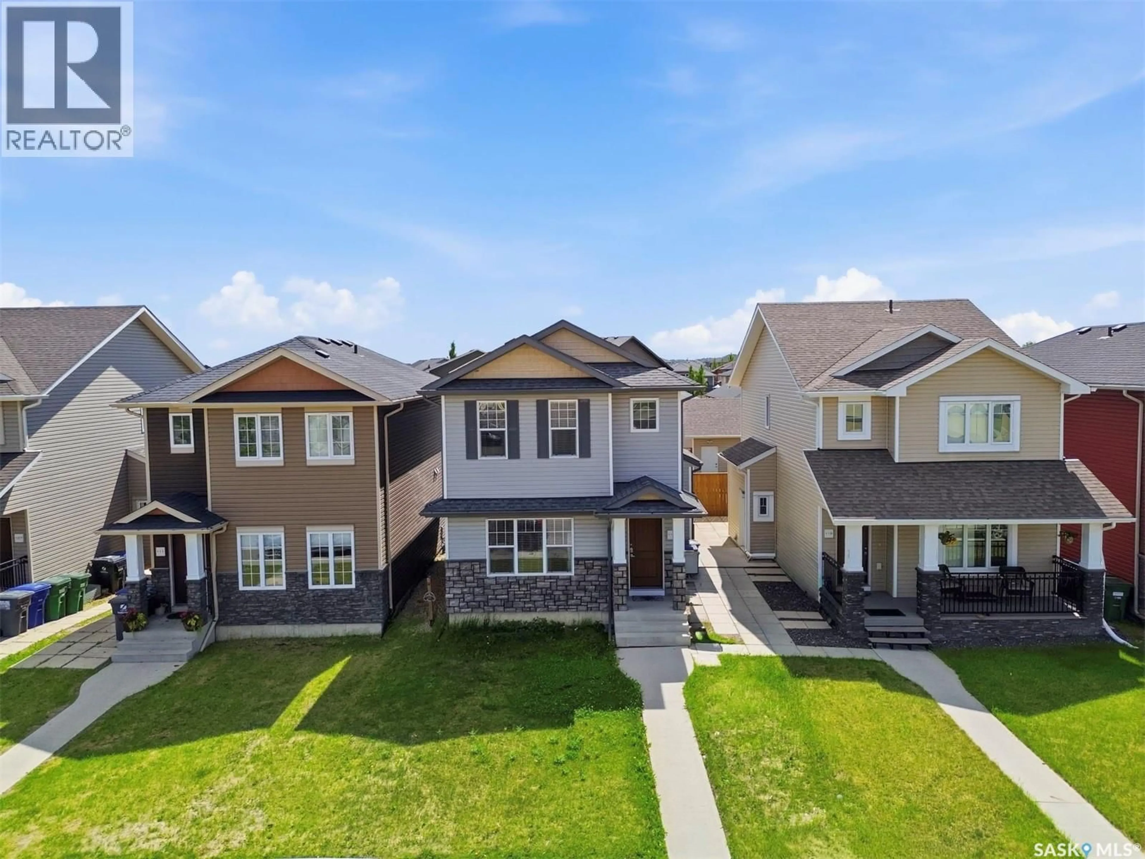 A pic from outside/outdoor area/front of a property/back of a property/a pic from drone, street for 115 TWEED LANE, Saskatoon Saskatchewan S7V0K1