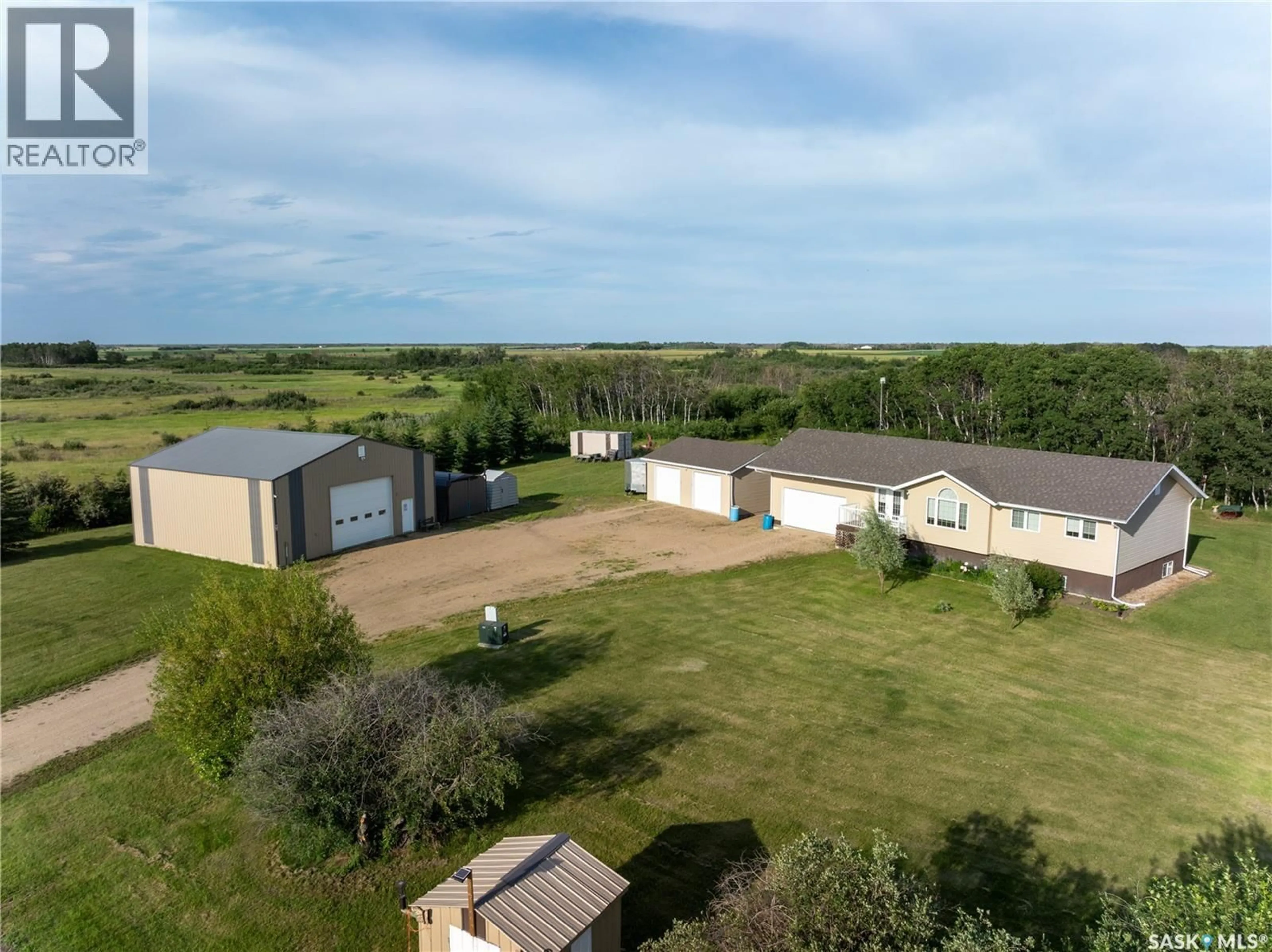 A pic from outside/outdoor area/front of a property/back of a property/a pic from drone, building for BASSINGTHWAITE ACREAGE, Asquith Saskatchewan S0K0J0