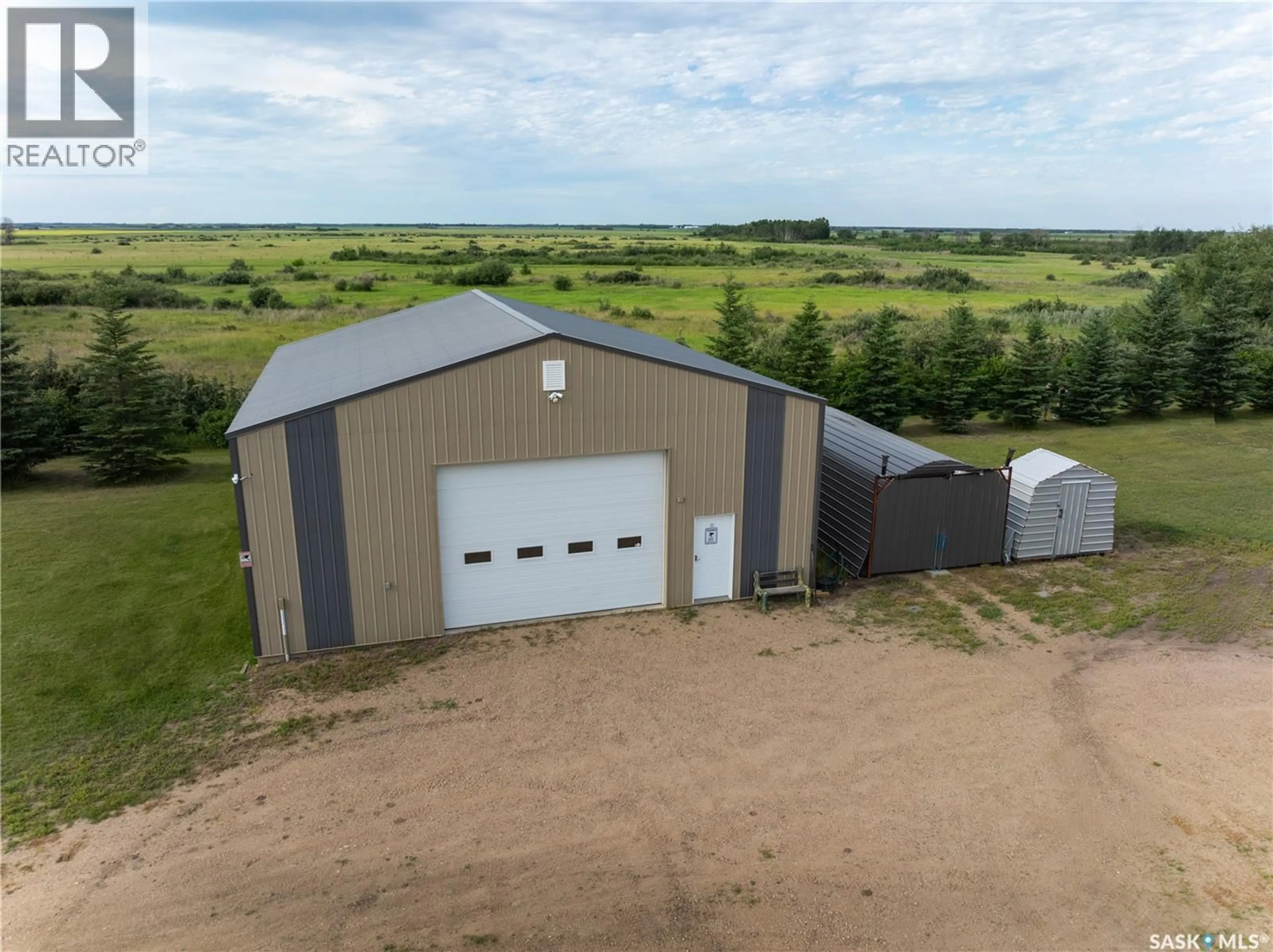 A pic from outside/outdoor area/front of a property/back of a property/a pic from drone, building for BASSINGTHWAITE ACREAGE, Asquith Saskatchewan S0K0J0