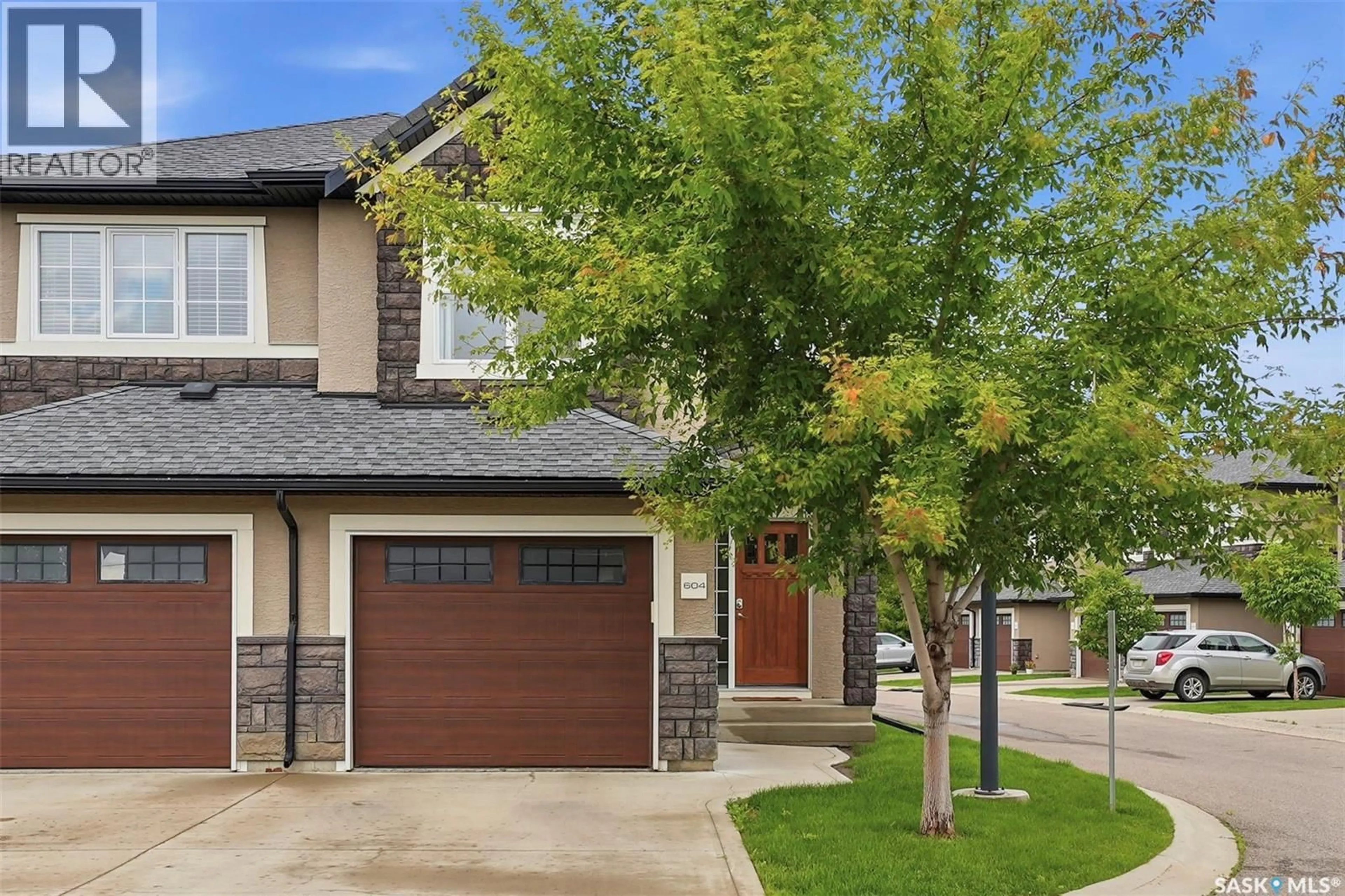 Home with brick exterior material, street for 2012 - 604 POHORECKY CRESCENT, Saskatoon Saskatchewan S7W0V4