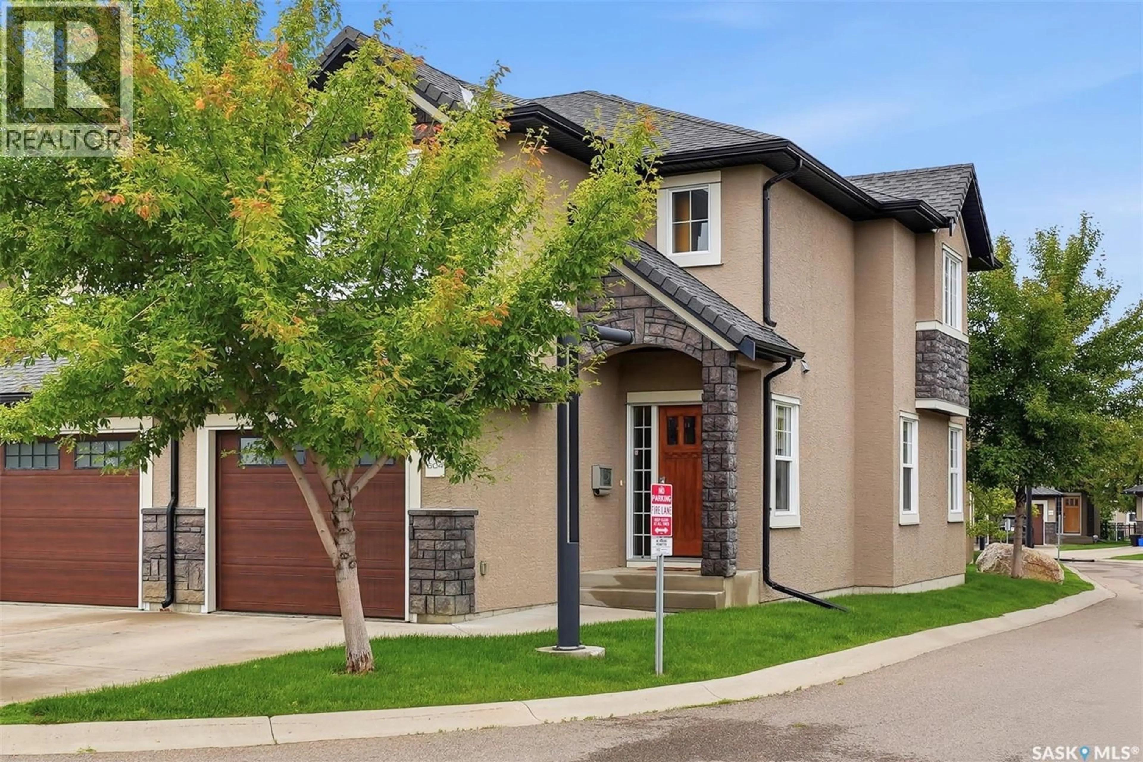 Home with brick exterior material, street for 2012 - 604 POHORECKY CRESCENT, Saskatoon Saskatchewan S7W0V4