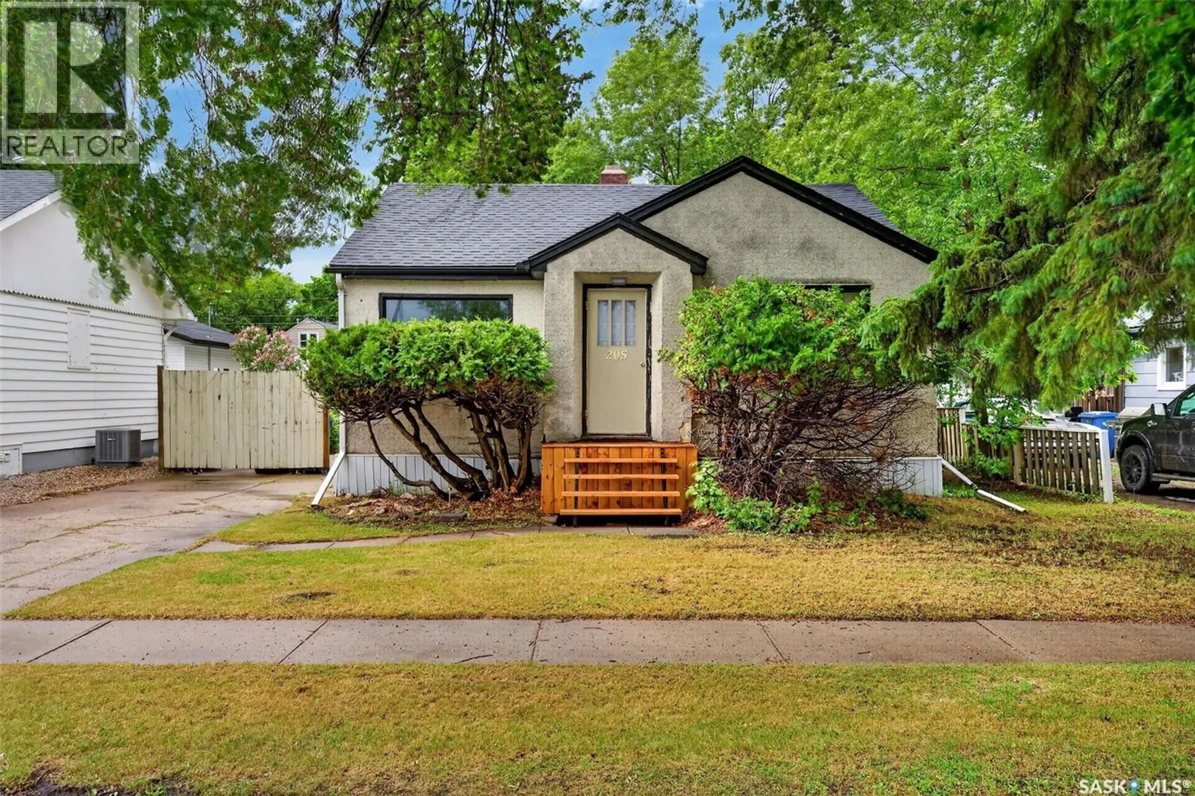Home with vinyl exterior material, street for 205 BEMISTER AVENUE, Melfort Saskatchewan S0E1A0