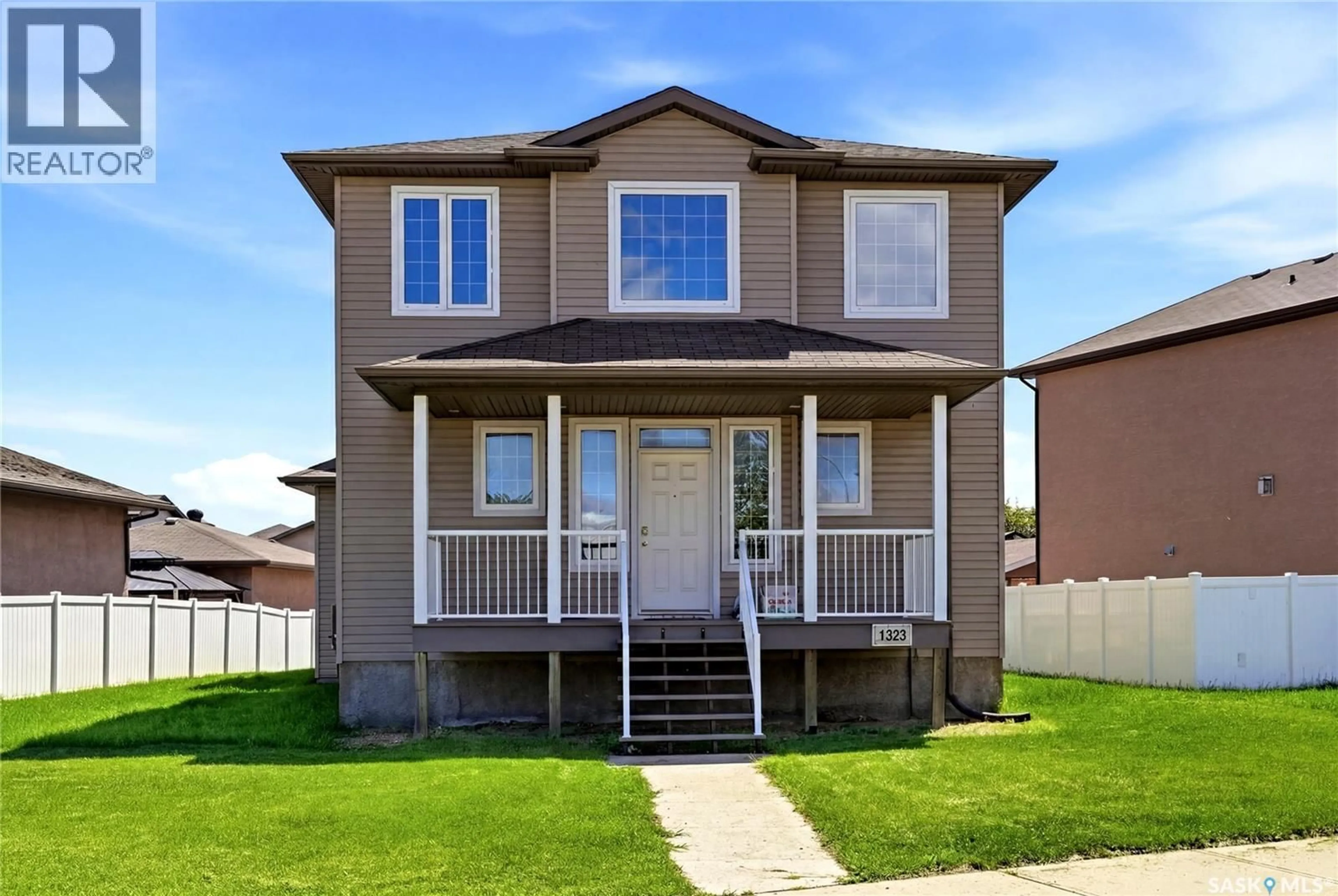 Home with vinyl exterior material, street for 1323 BROAD STREET, Regina Saskatchewan S4X0A5