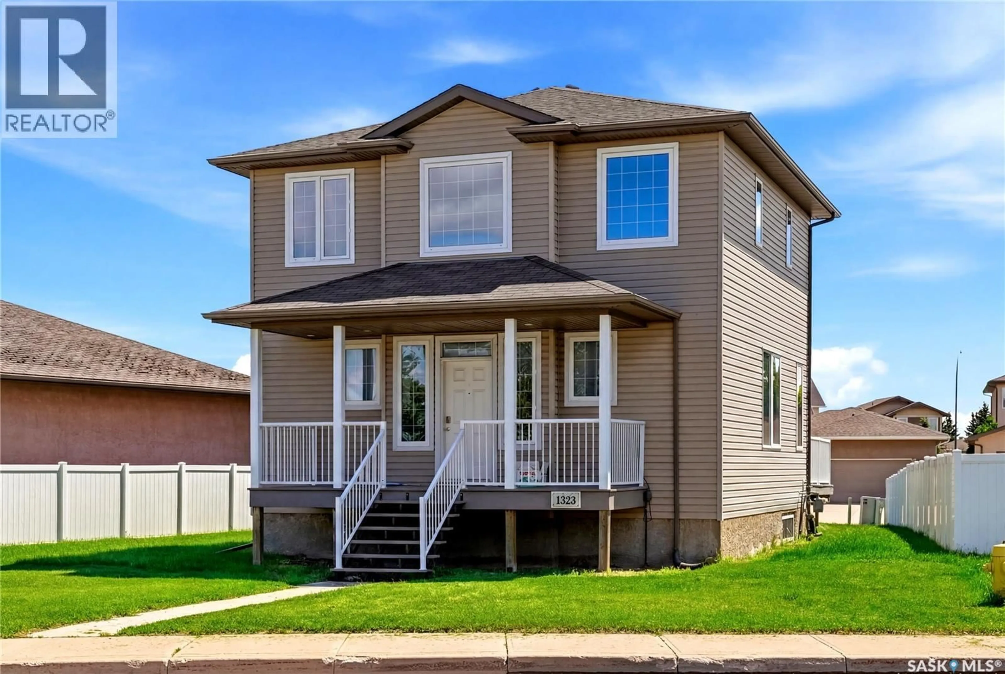 Home with vinyl exterior material, street for 1323 BROAD STREET, Regina Saskatchewan S4X0A5
