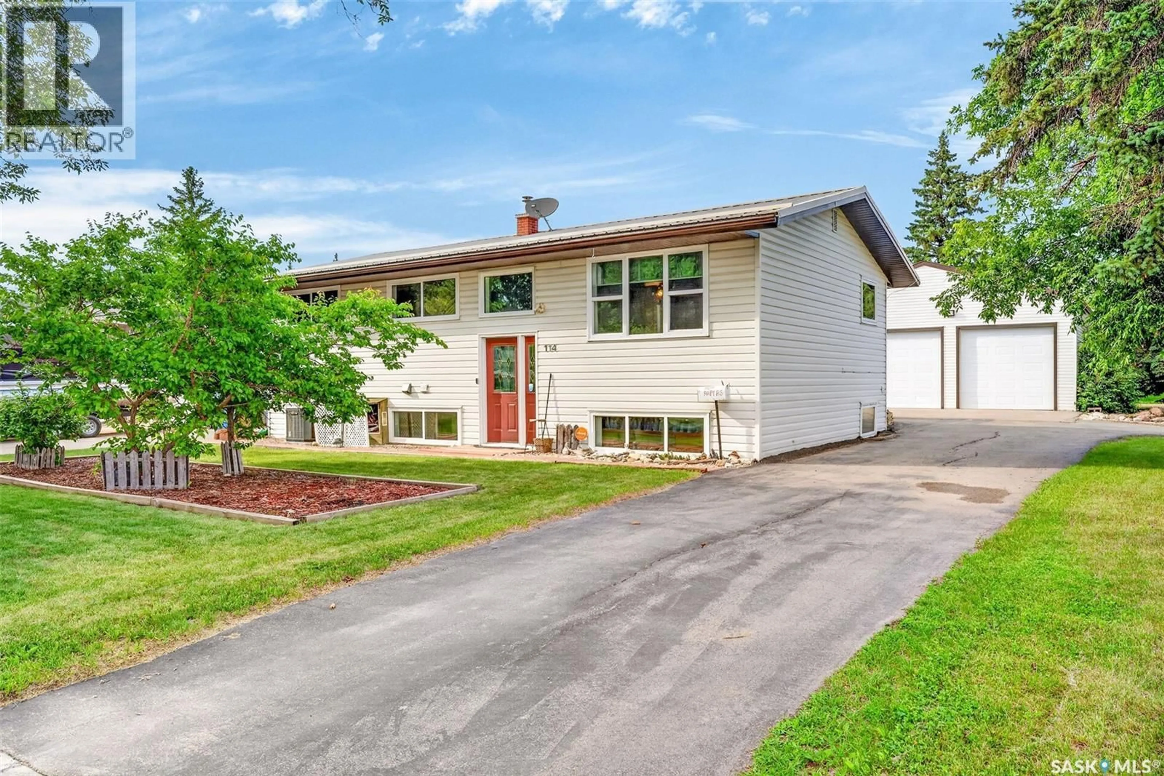 Home with vinyl exterior material, street for E - 114 HATTON AVENUE, Melfort Saskatchewan S0E1A0