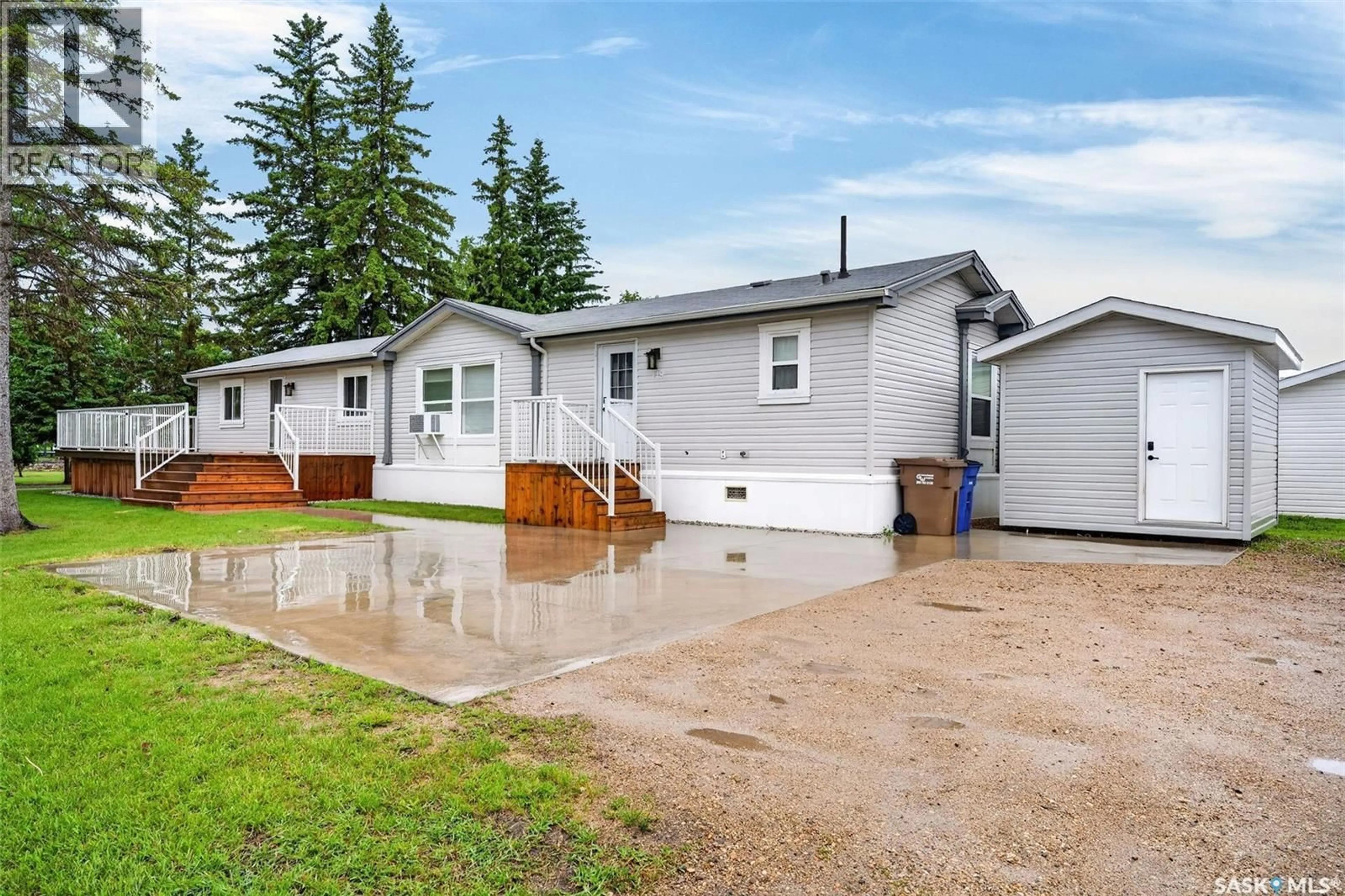 Home with vinyl exterior material, street for 119 RAILWAY AVENUE, Kinistino Saskatchewan S0J1H0