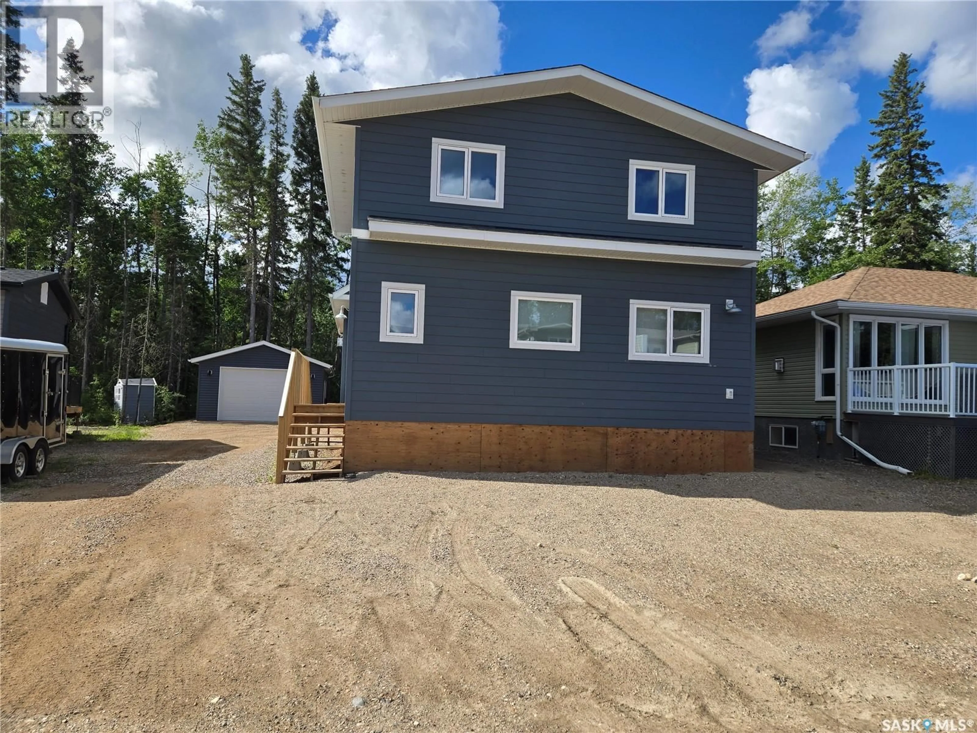 Home with vinyl exterior material, street for 116 RUMBERGER ROAD, Candle Lake Saskatchewan S0J3E0