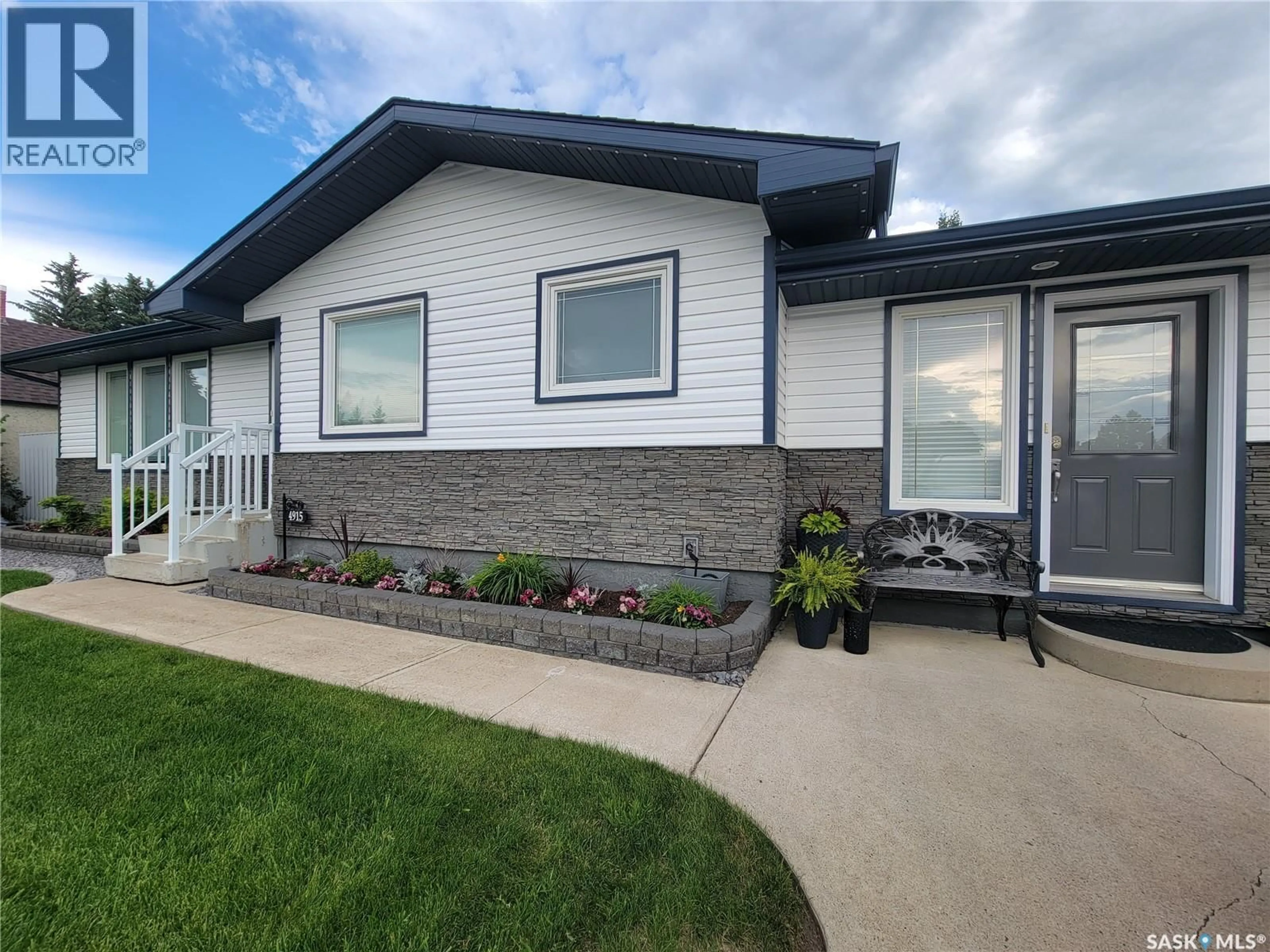 Home with vinyl exterior material, street for 4915 POST STREET, Macklin Saskatchewan S0L2C0