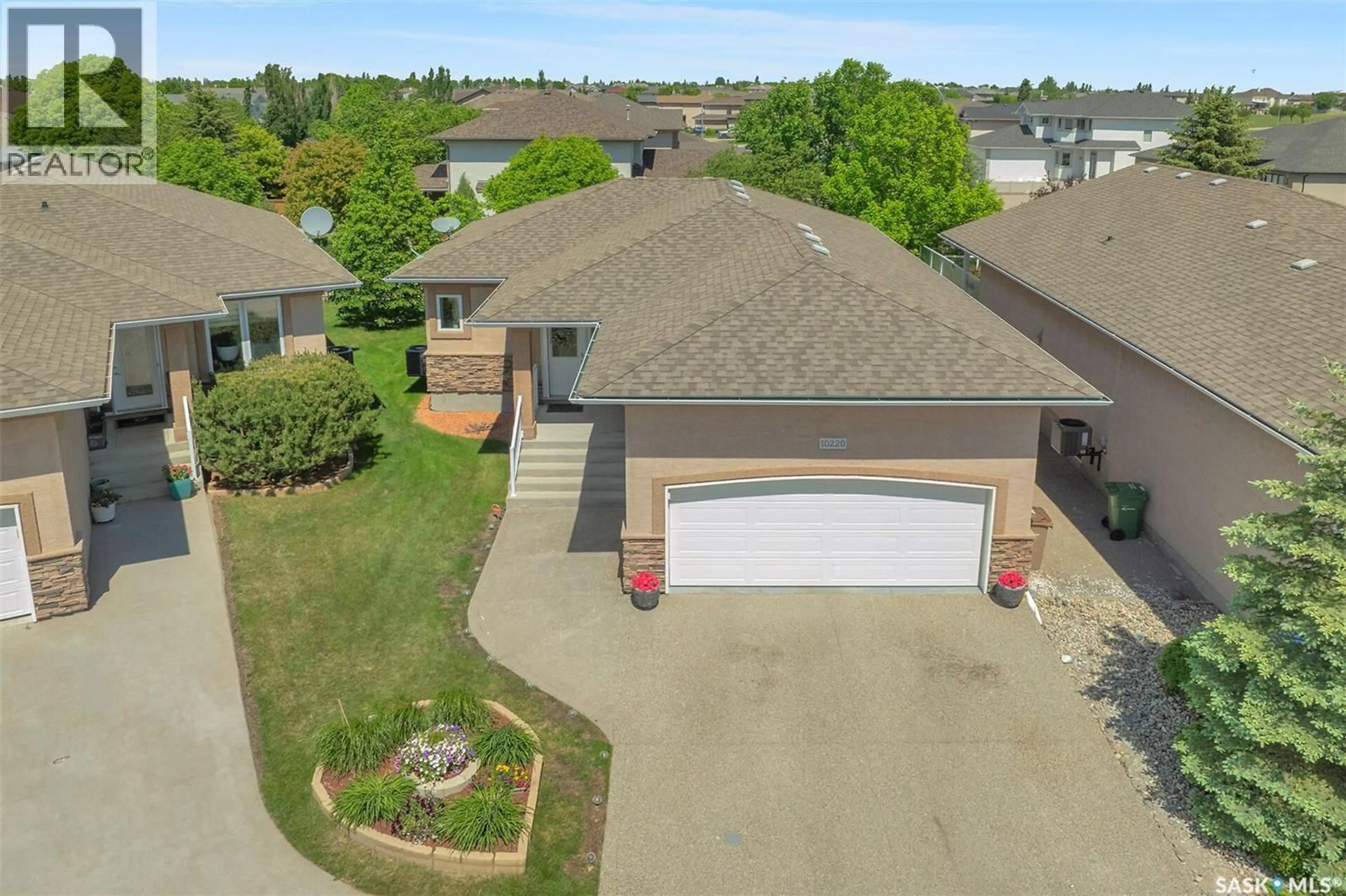 A pic from outside/outdoor area/front of a property/back of a property/a pic from drone, street for 10220 WASCANA ESTATES, Regina Saskatchewan S4V3E5