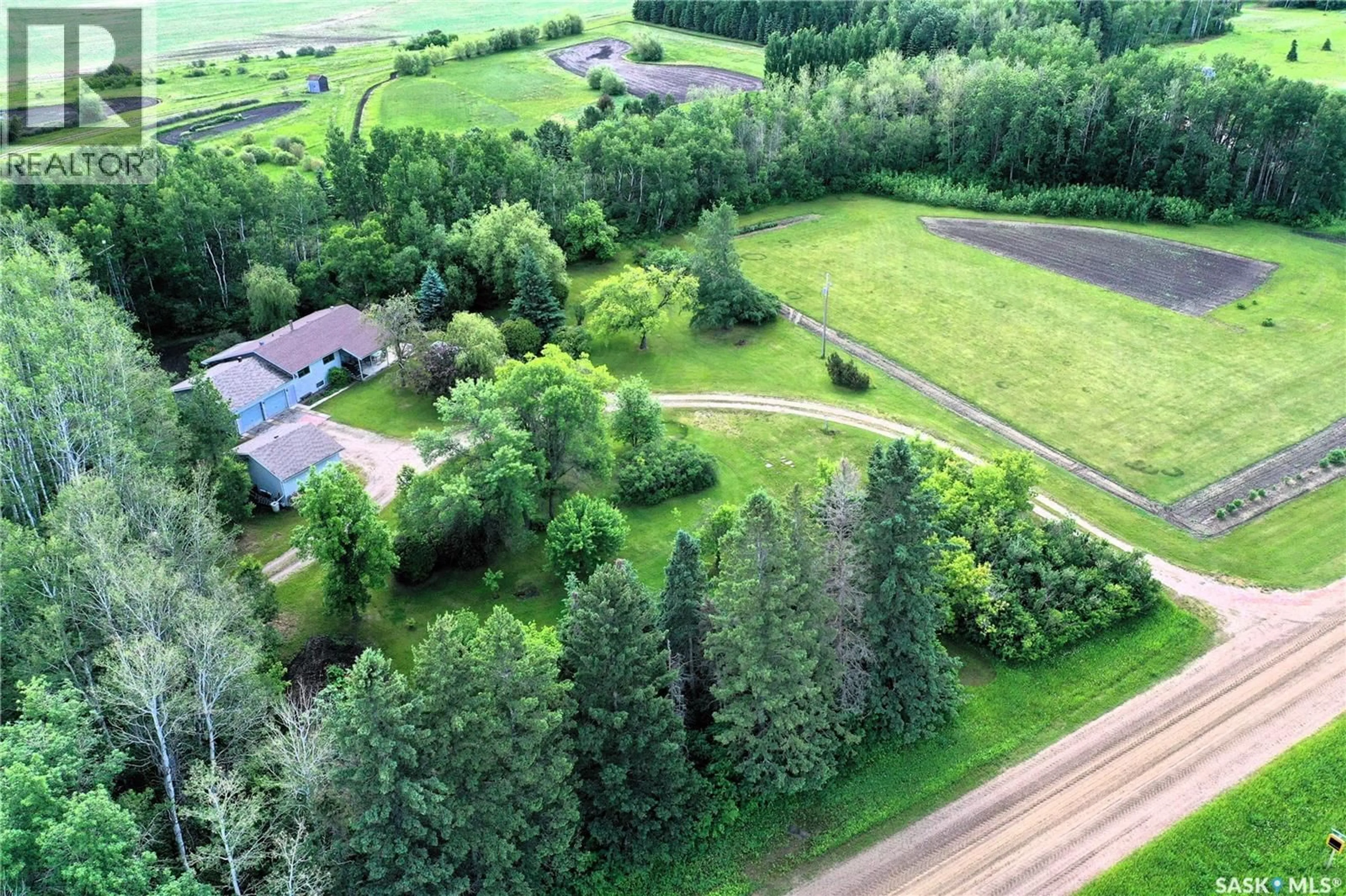 A pic from outside/outdoor area/front of a property/back of a property/a pic from drone, forest/trees view for 818 KELSEY PLACE, Torch River Rm No. 488 Saskatchewan S0J0Z0