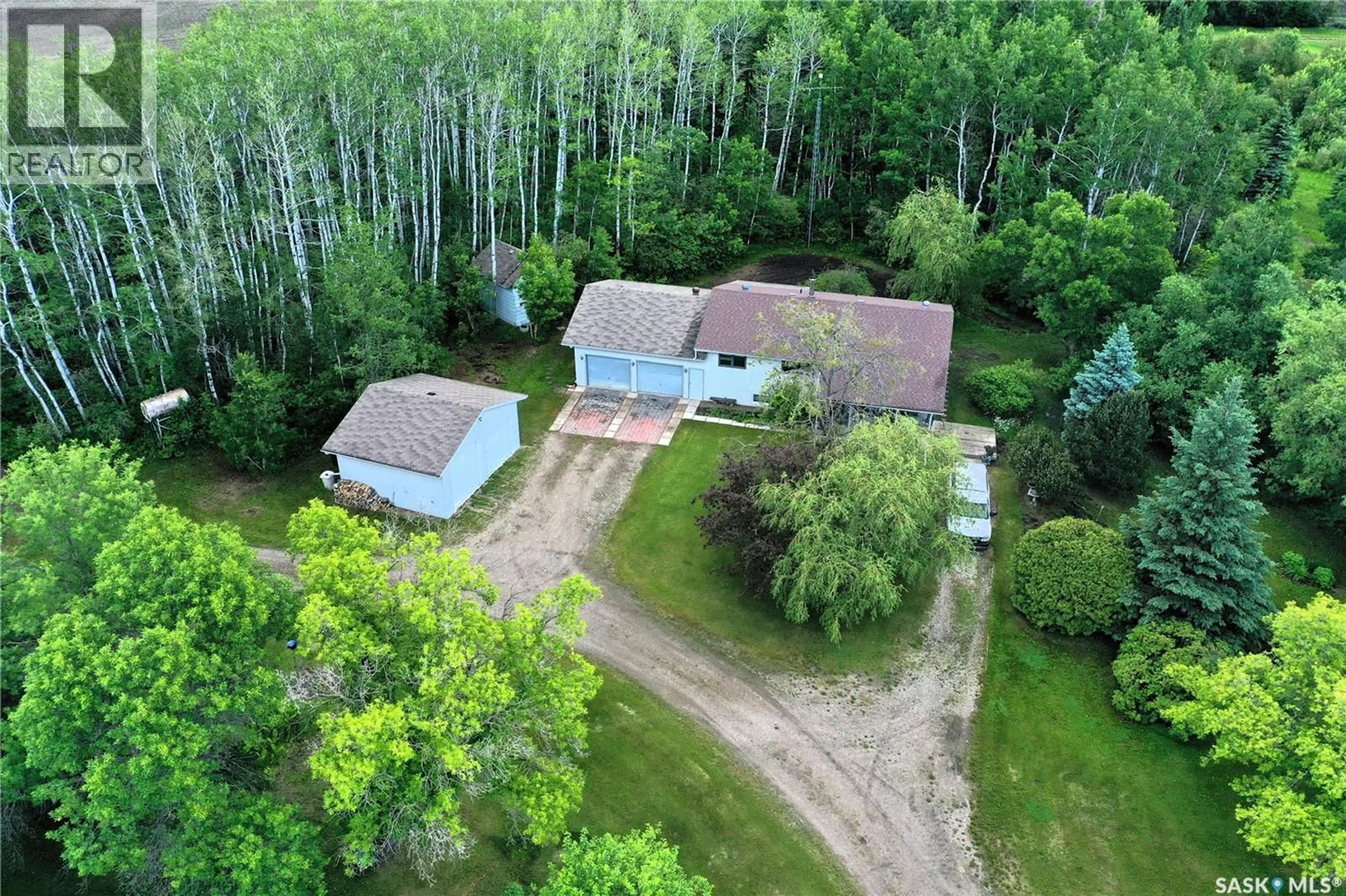 A pic from outside/outdoor area/front of a property/back of a property/a pic from drone, forest/trees view for 818 KELSEY PLACE, Torch River Rm No. 488 Saskatchewan S0J0Z0