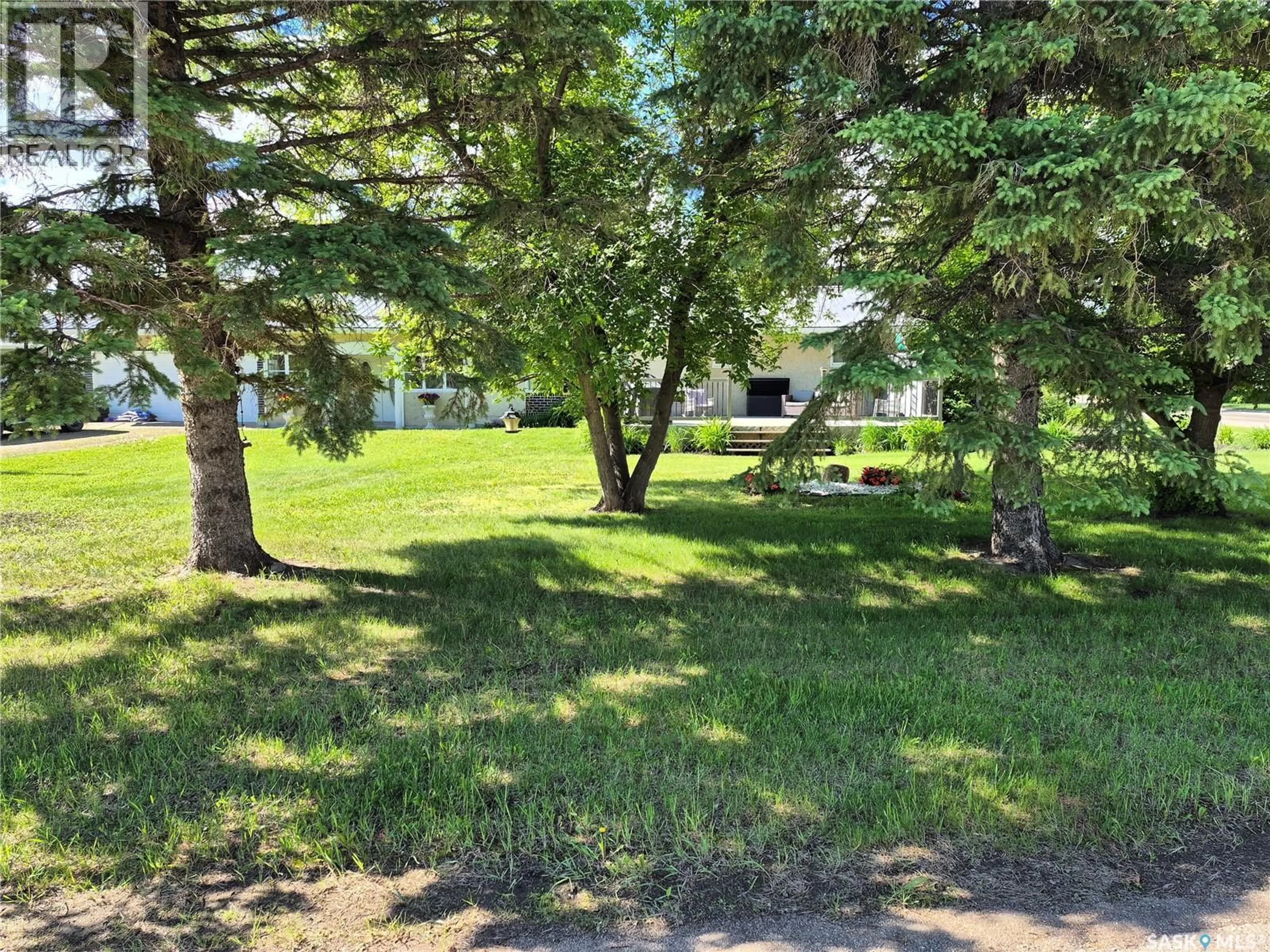 A pic from outside/outdoor area/front of a property/back of a property/a pic from drone, forest/trees view for 300 DION AVENUE, Cut Knife Saskatchewan S0M0M0