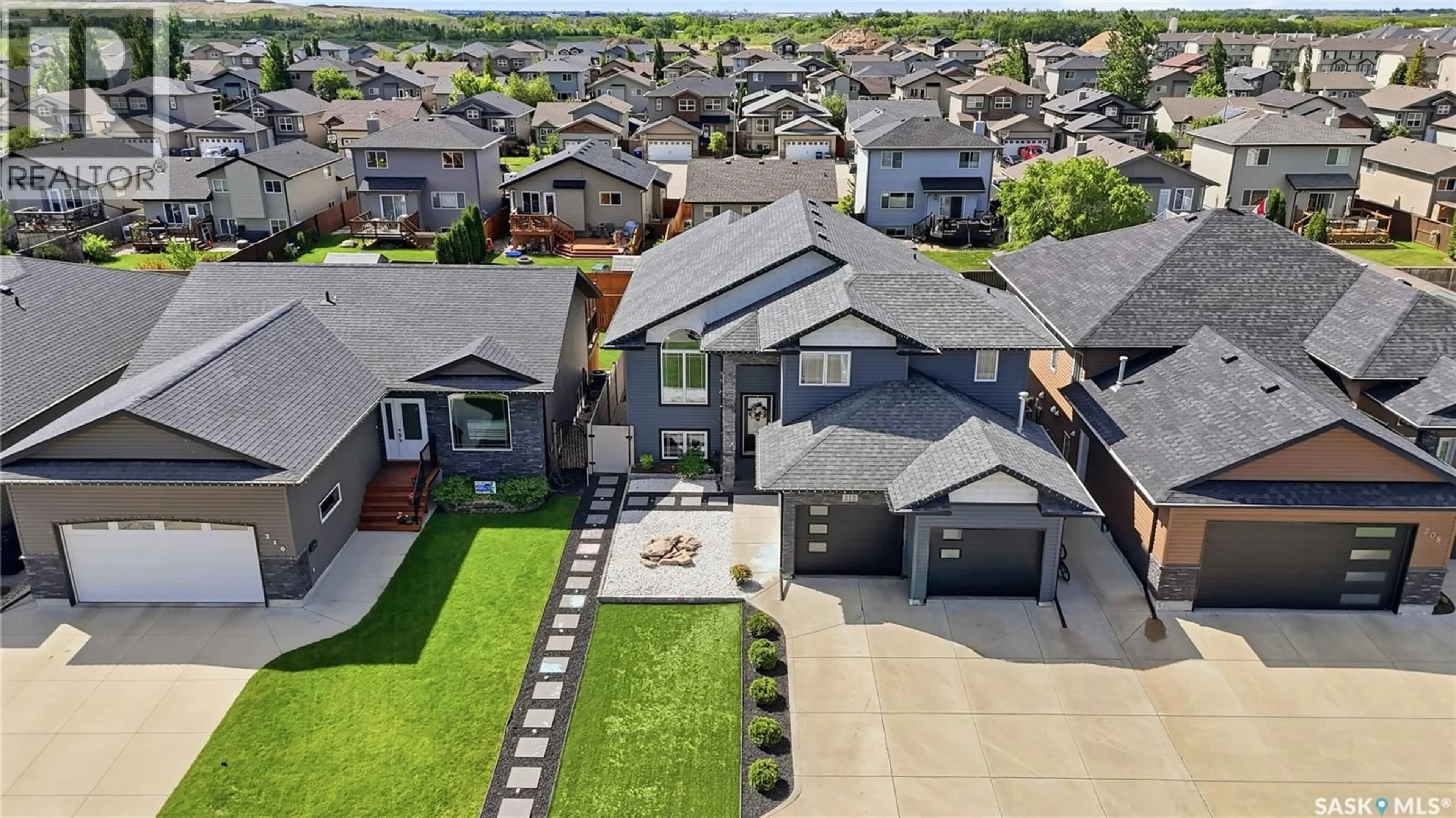 A pic from outside/outdoor area/front of a property/back of a property/a pic from drone, street for 212 GLENWOOD TERRACE, Martensville Saskatchewan S0K0A2