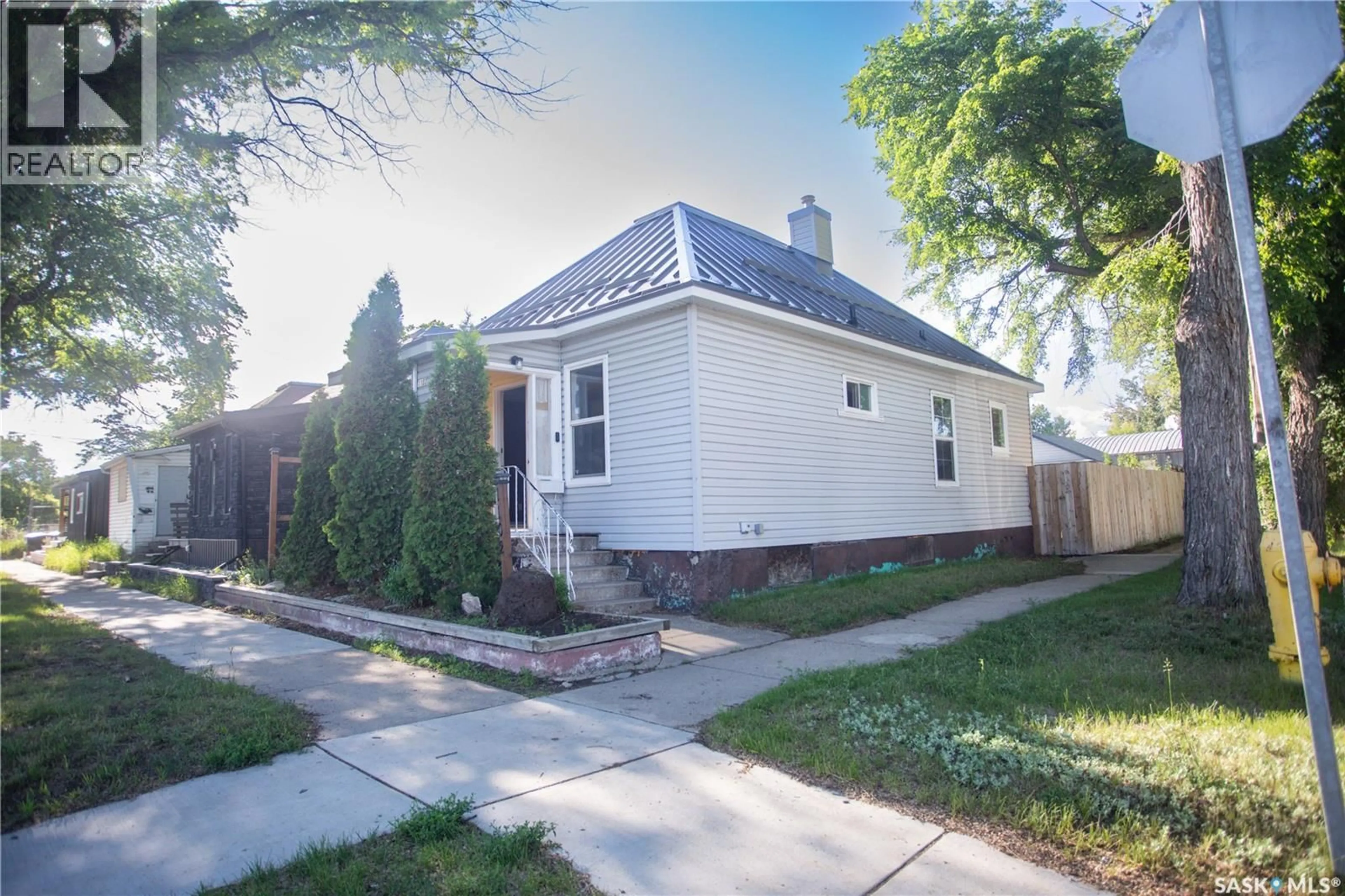 Home with brick exterior material, street for 1102 19TH STREET, Saskatoon Saskatchewan S7M1C4