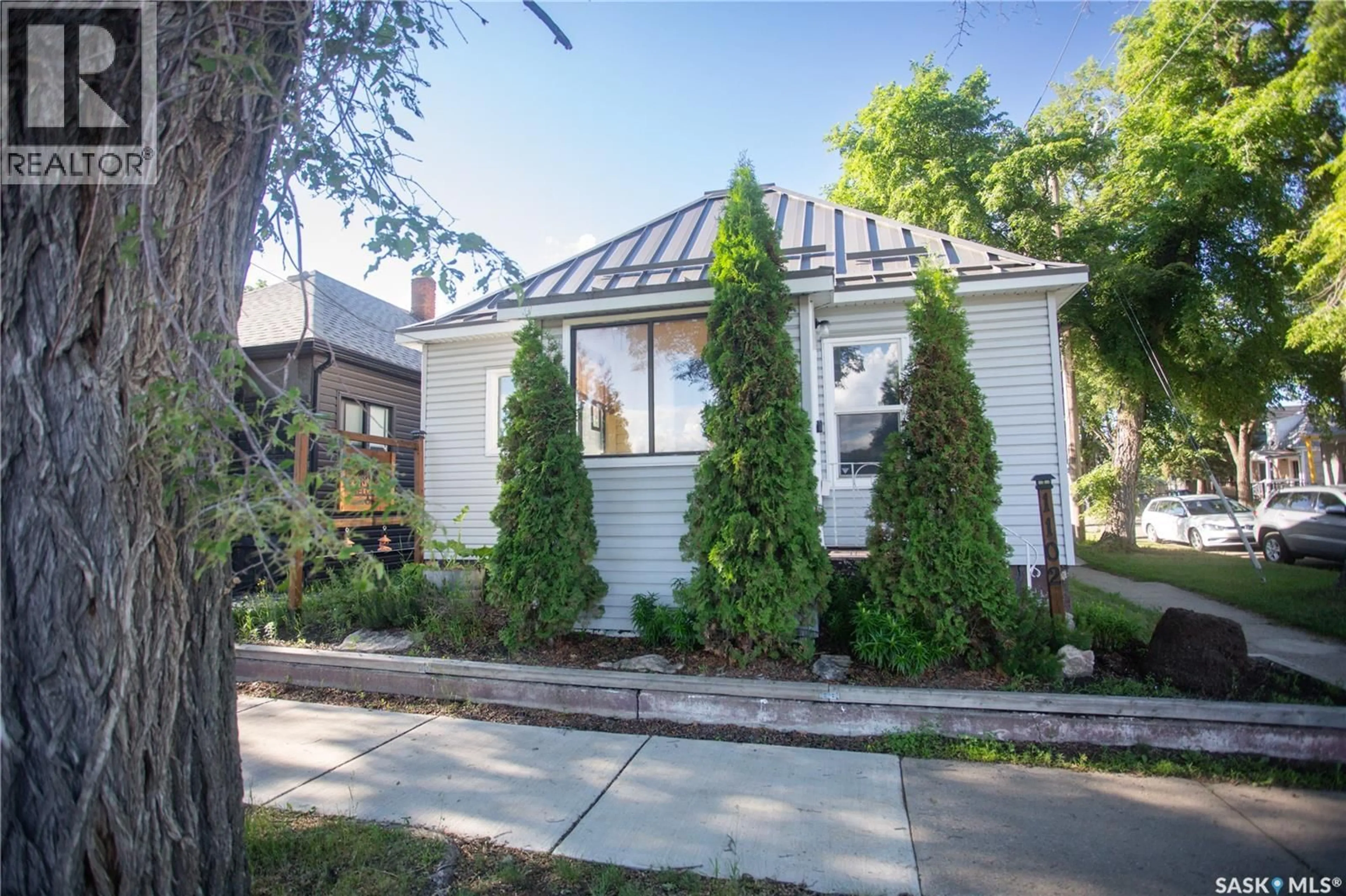 Home with brick exterior material, street for 1102 19TH STREET, Saskatoon Saskatchewan S7M1C4