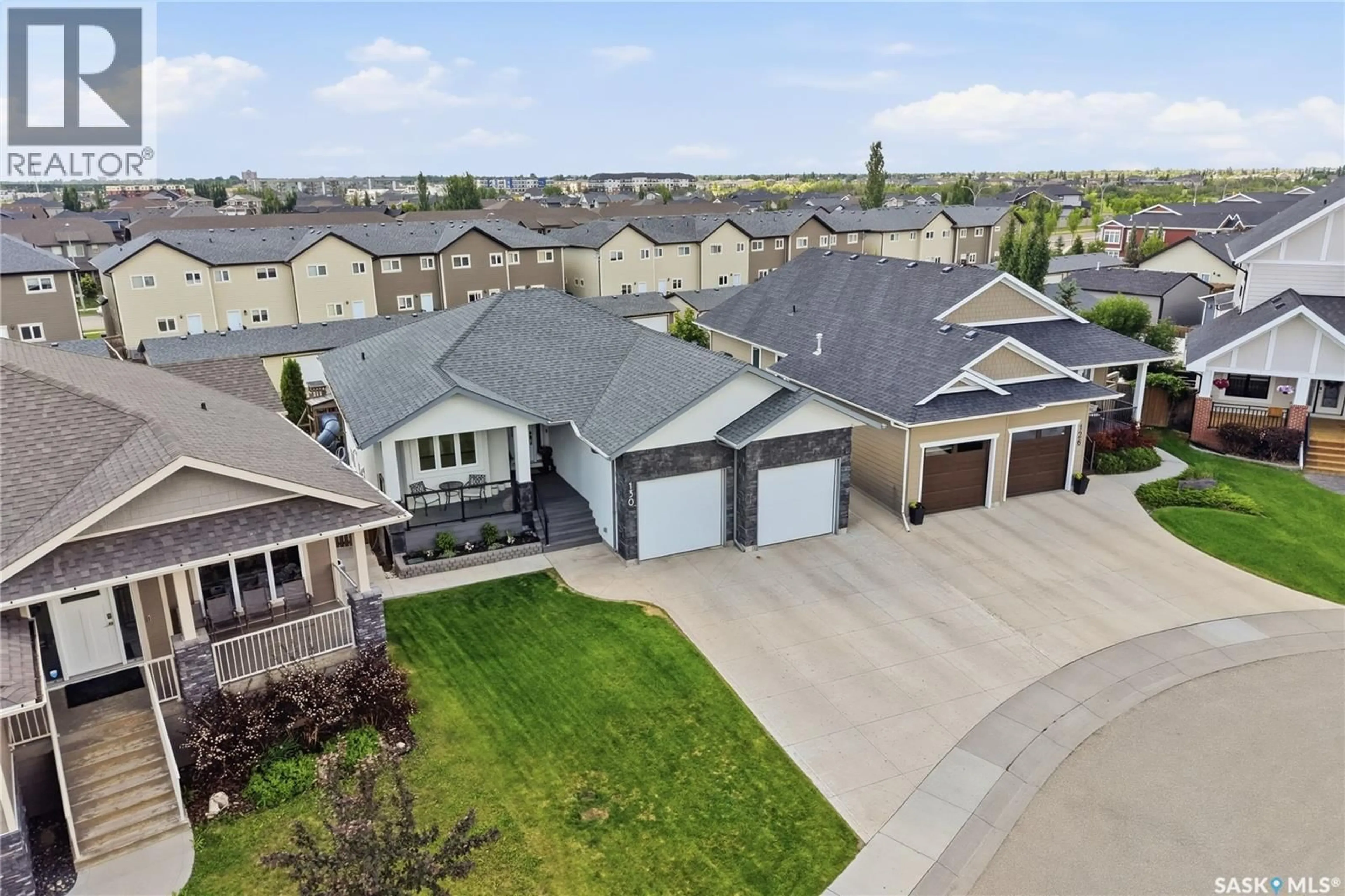A pic from outside/outdoor area/front of a property/back of a property/a pic from drone, street for 130 SINCLAIR CRESCENT, Saskatoon Saskatchewan S7V0A4