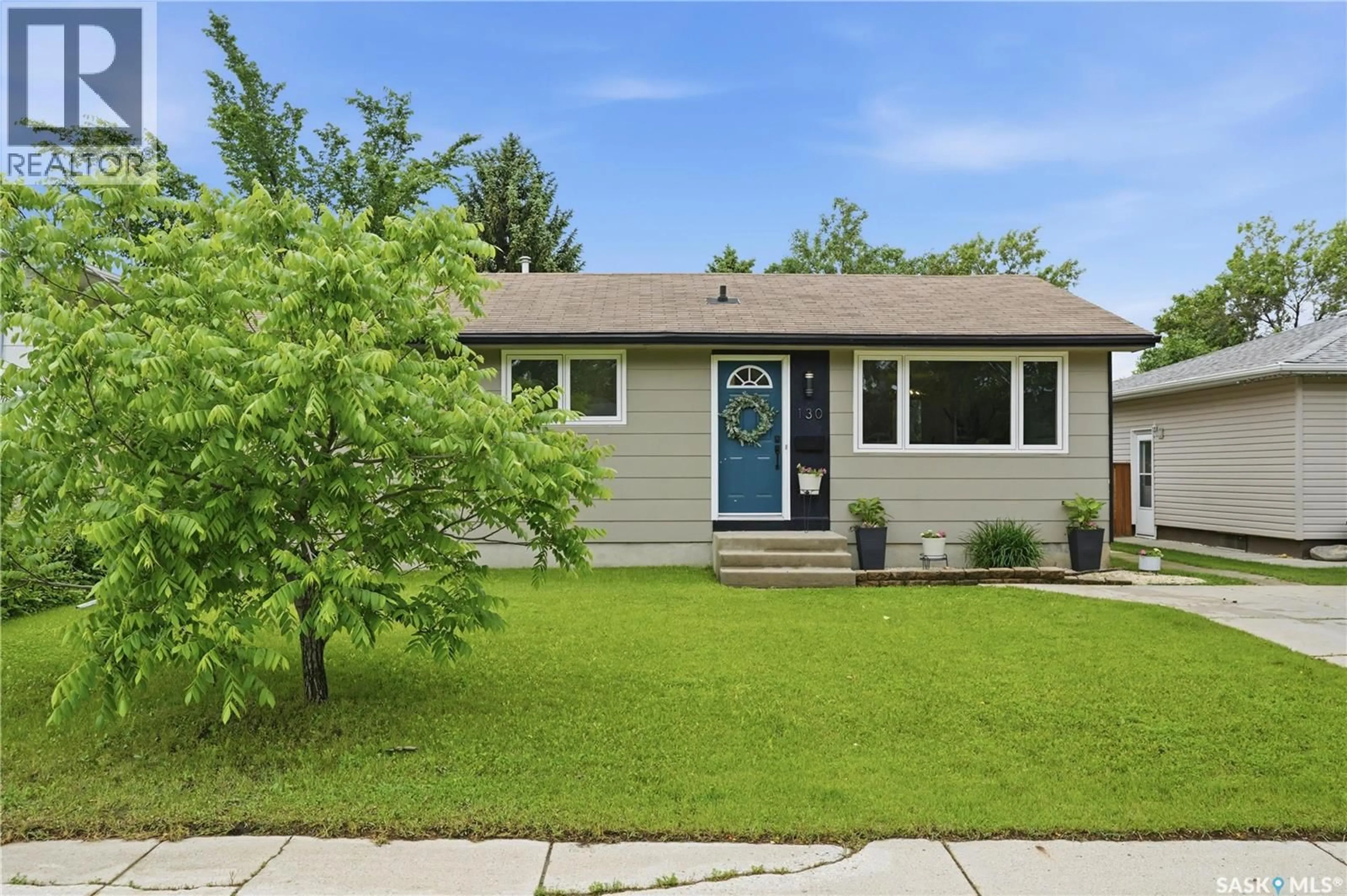 Home with vinyl exterior material, street for 130 BIRCH CRESCENT, Saskatoon Saskatchewan S7N2M3
