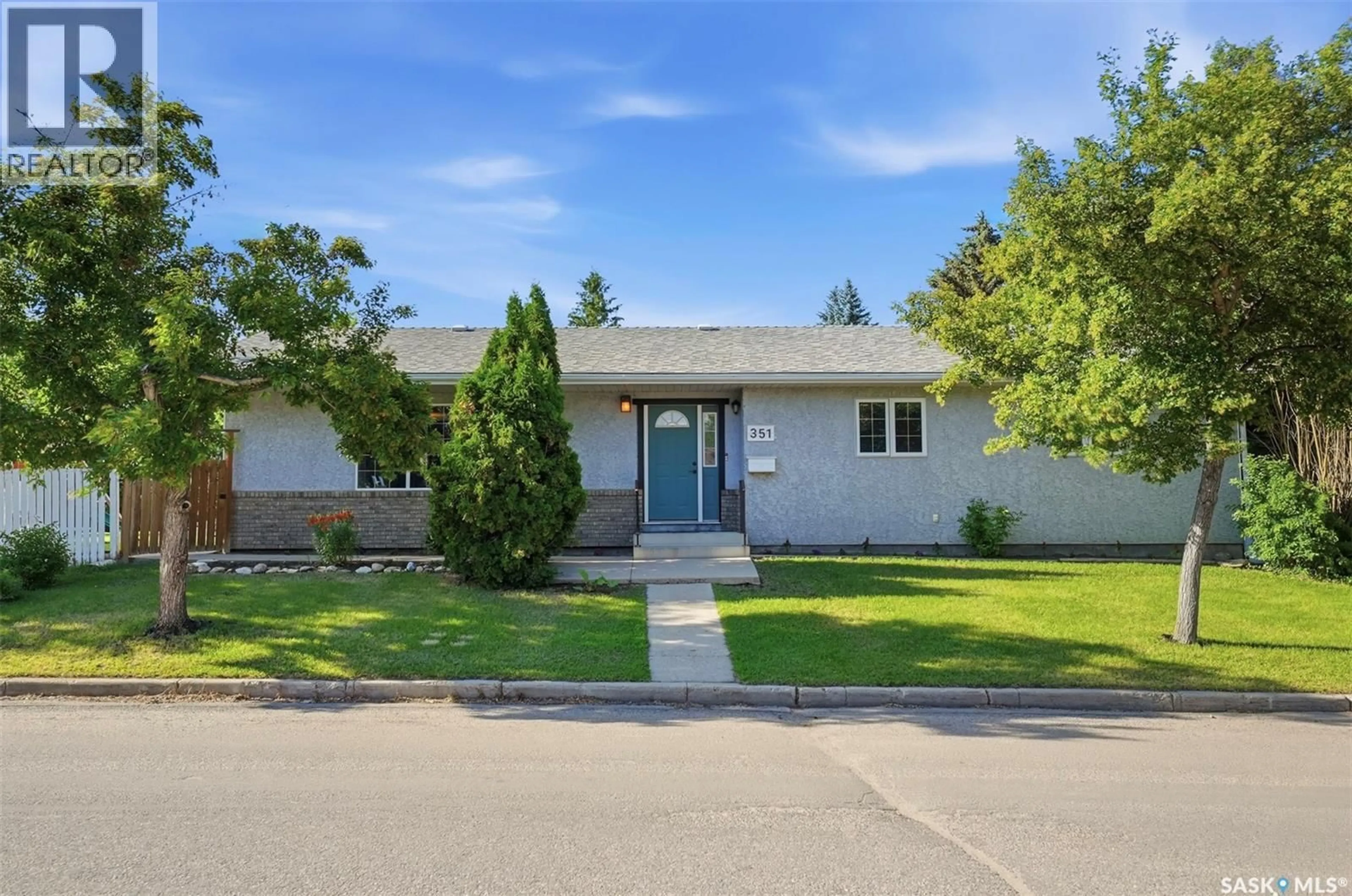 Home with vinyl exterior material, street for 351 Y AVENUE, Saskatoon Saskatchewan S7M3J6