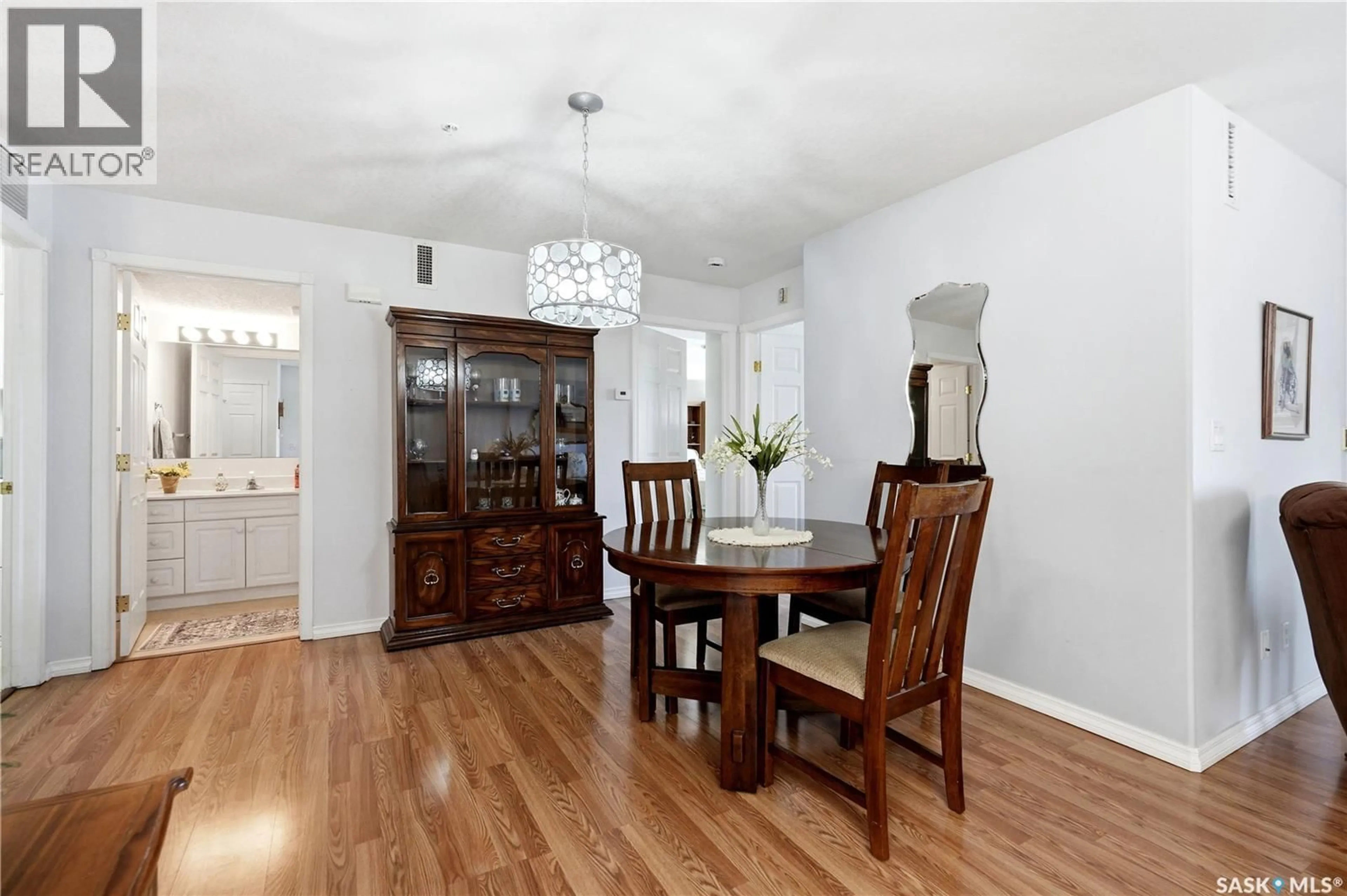 Dining room, wood/laminate floor for 325 - 305 KEEVIL CRESCENT, Saskatoon Saskatchewan S7N4R8
