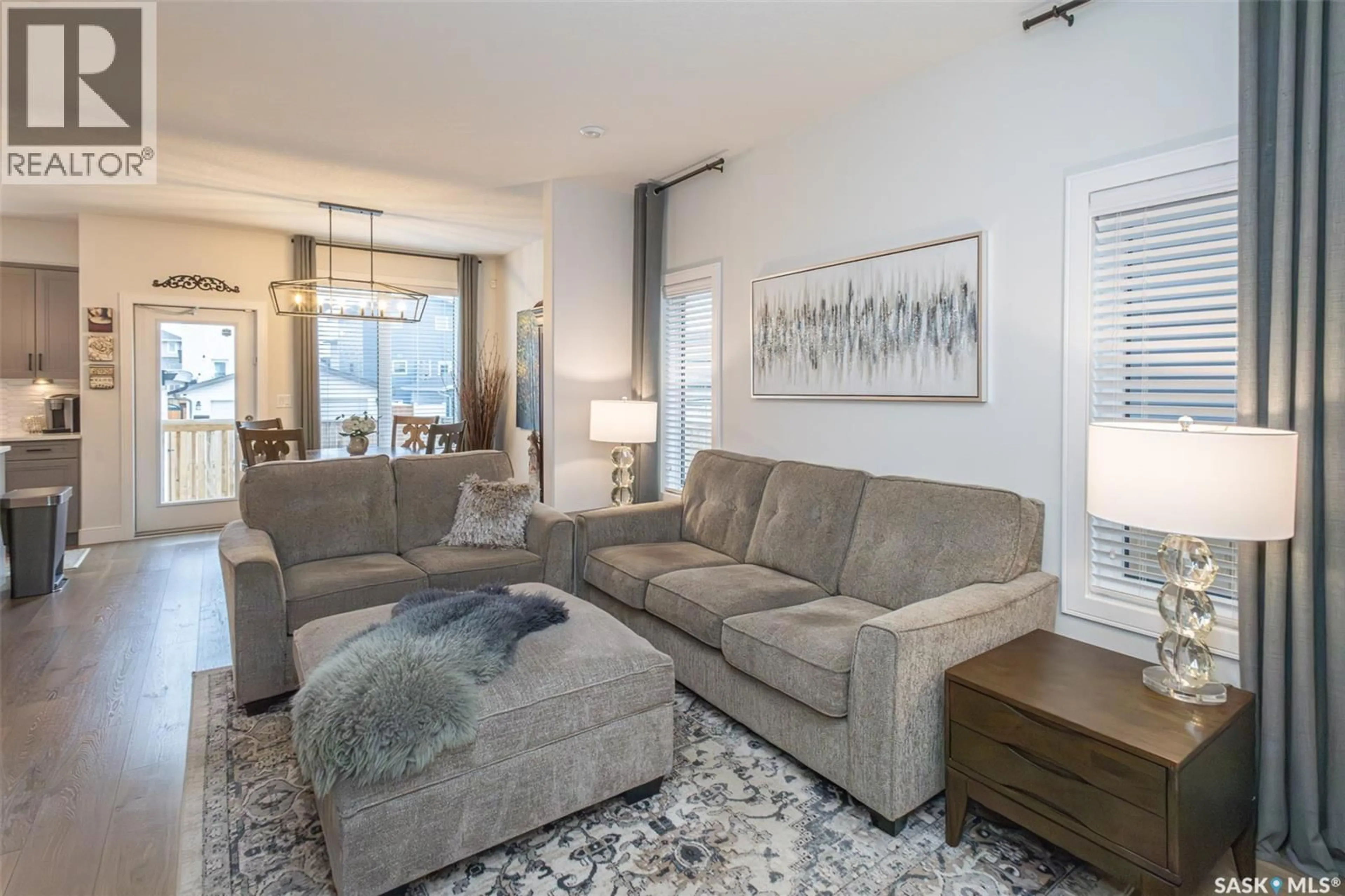 Living room with furniture, unknown for 1348 PARR HILL DRIVE, Martensville Saskatchewan S0K2T1