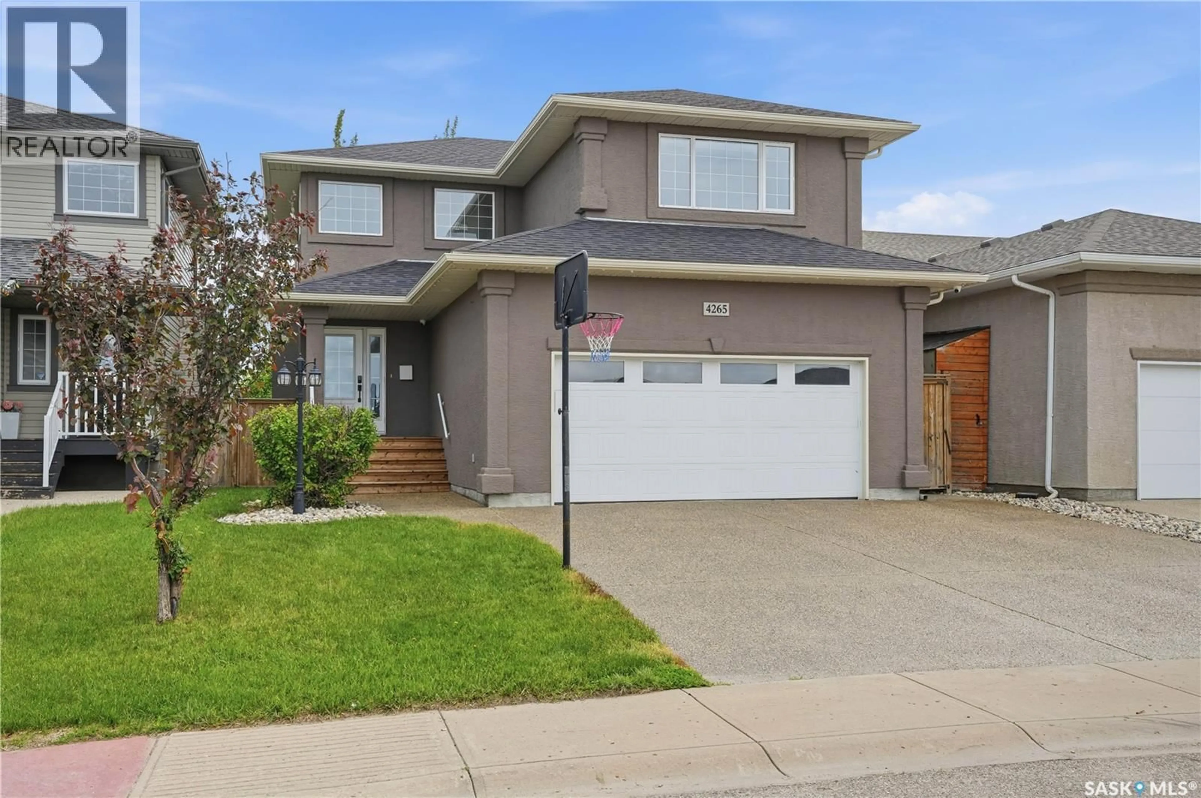 Home with vinyl exterior material, street for 4265 PRESTON CRESCENT, Regina Saskatchewan S4X0C9