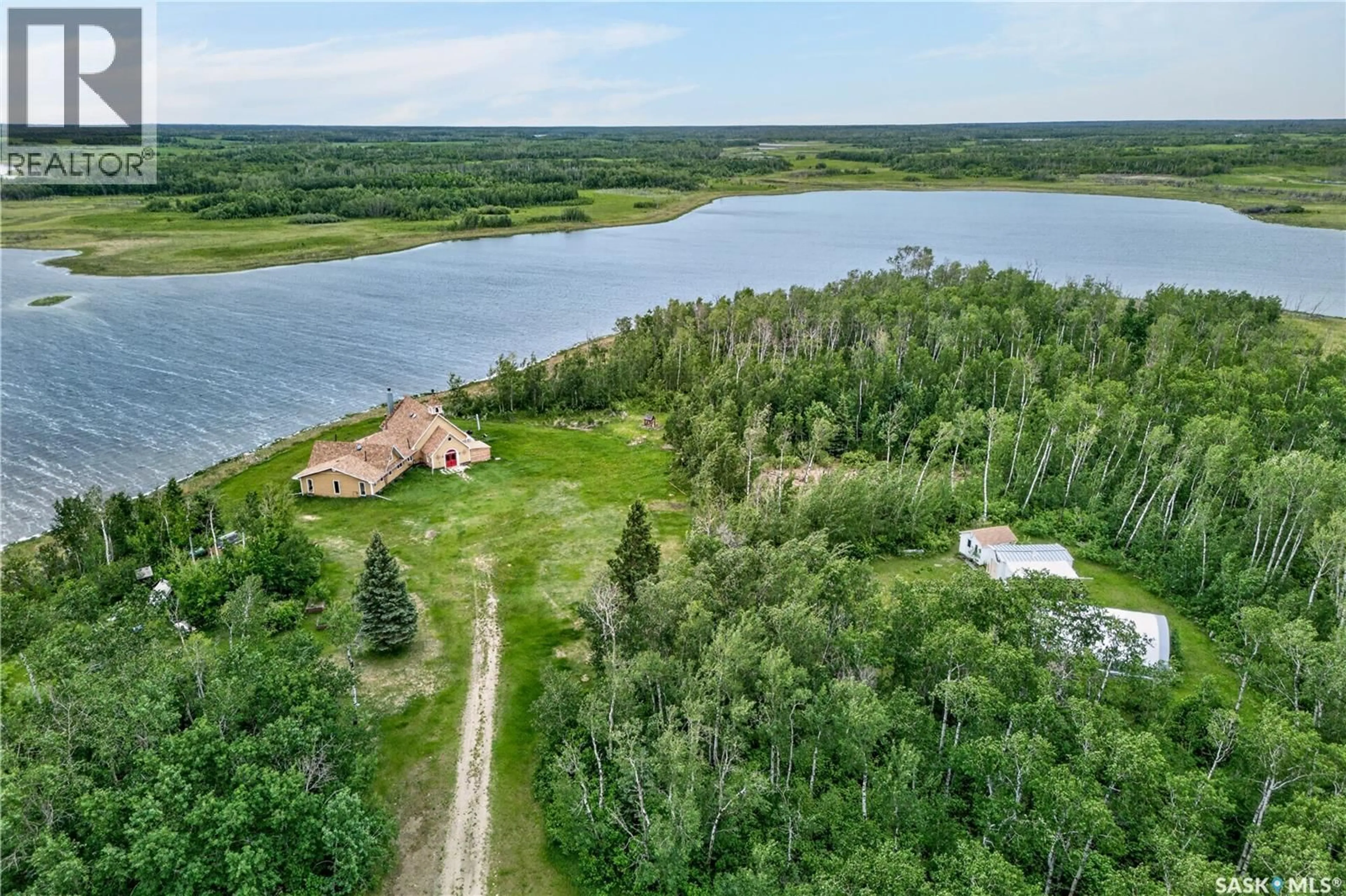 A pic from outside/outdoor area/front of a property/back of a property/a pic from drone, water/lake/river/ocean view for ROSE ACREAGE, Duck Lake Rm No. 463 Saskatchewan S0K1J0