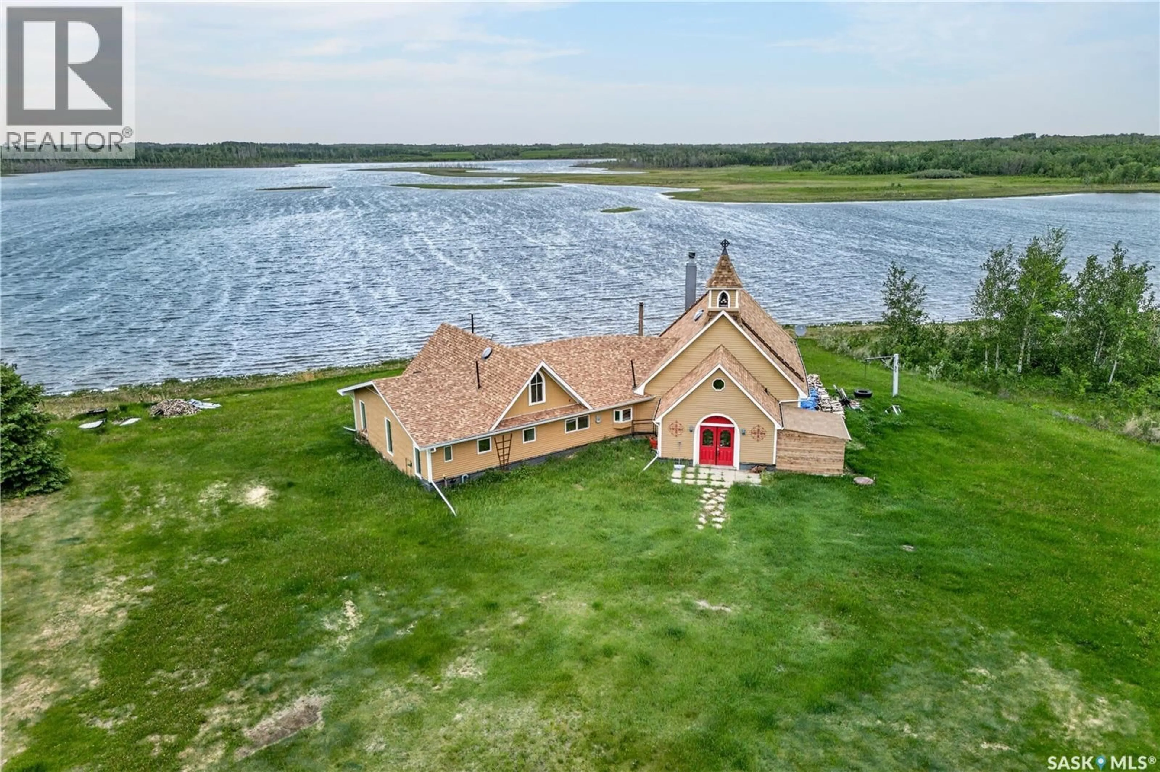 A pic from outside/outdoor area/front of a property/back of a property/a pic from drone, water/lake/river/ocean view for ROSE ACREAGE, Duck Lake Rm No. 463 Saskatchewan S0K1J0