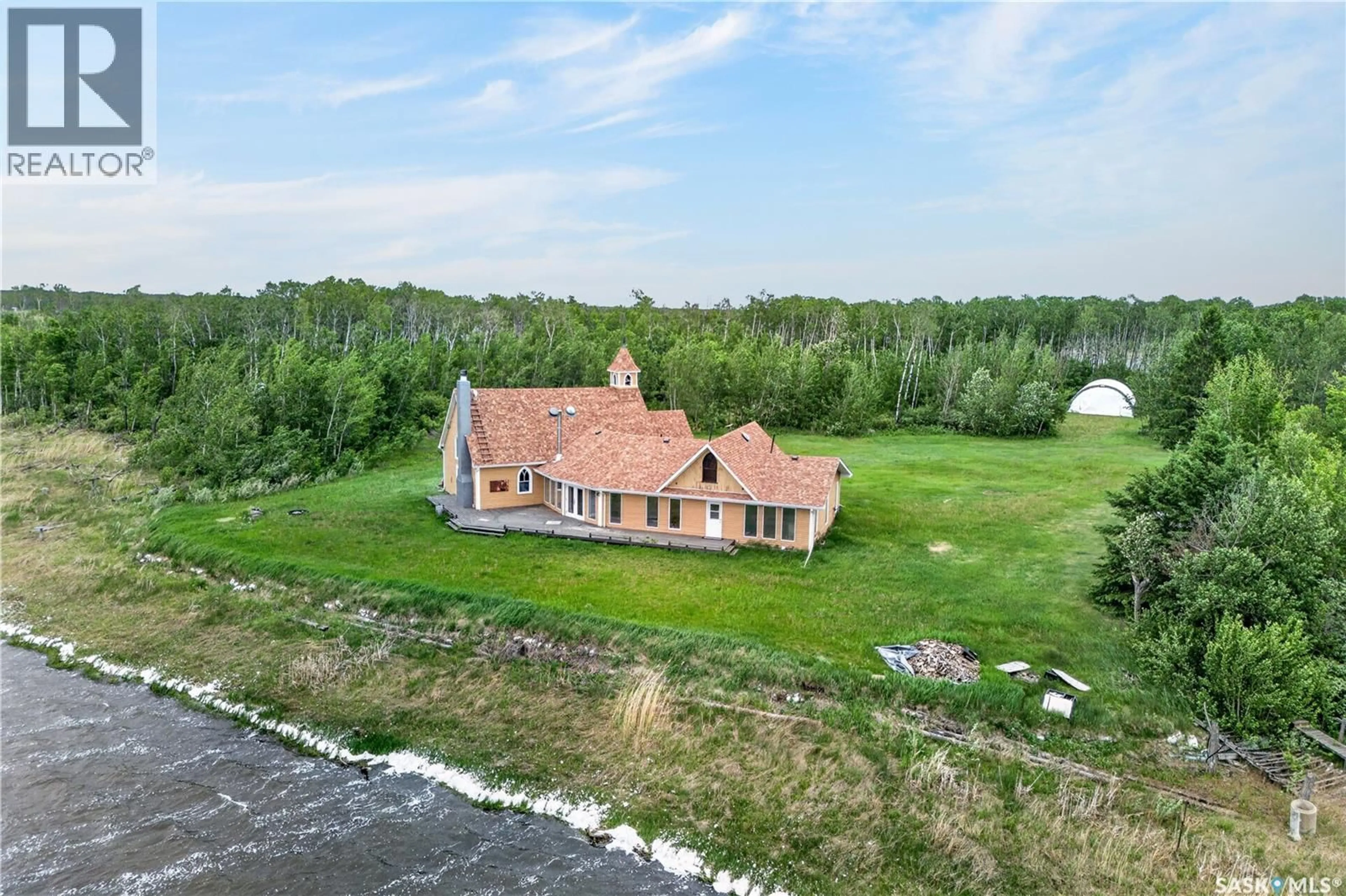 A pic from outside/outdoor area/front of a property/back of a property/a pic from drone, building for ROSE ACREAGE, Duck Lake Rm No. 463 Saskatchewan S0K1J0