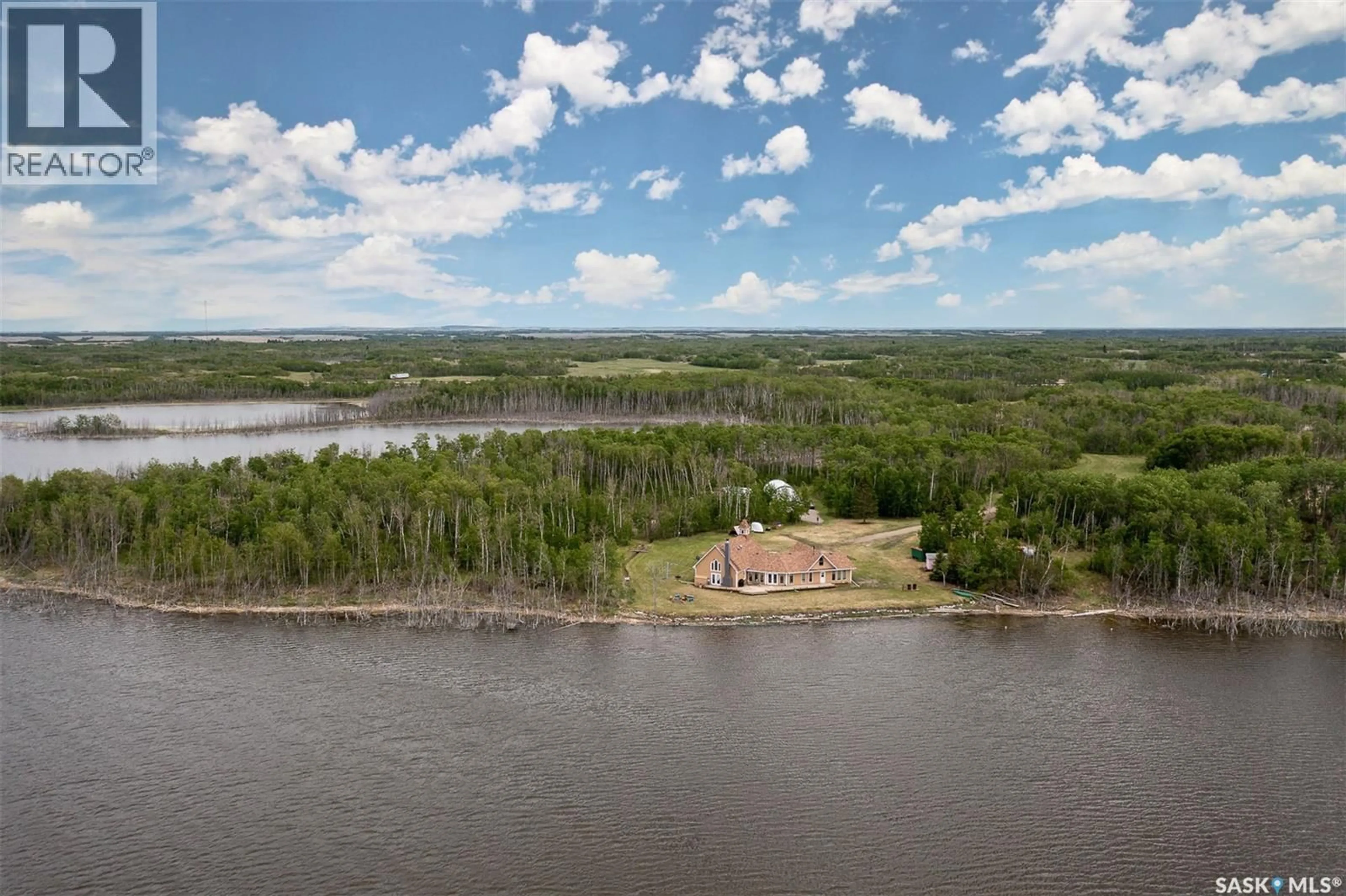 A pic from outside/outdoor area/front of a property/back of a property/a pic from drone, water/lake/river/ocean view for ROSE ACREAGE, Duck Lake Rm No. 463 Saskatchewan S0K1J0