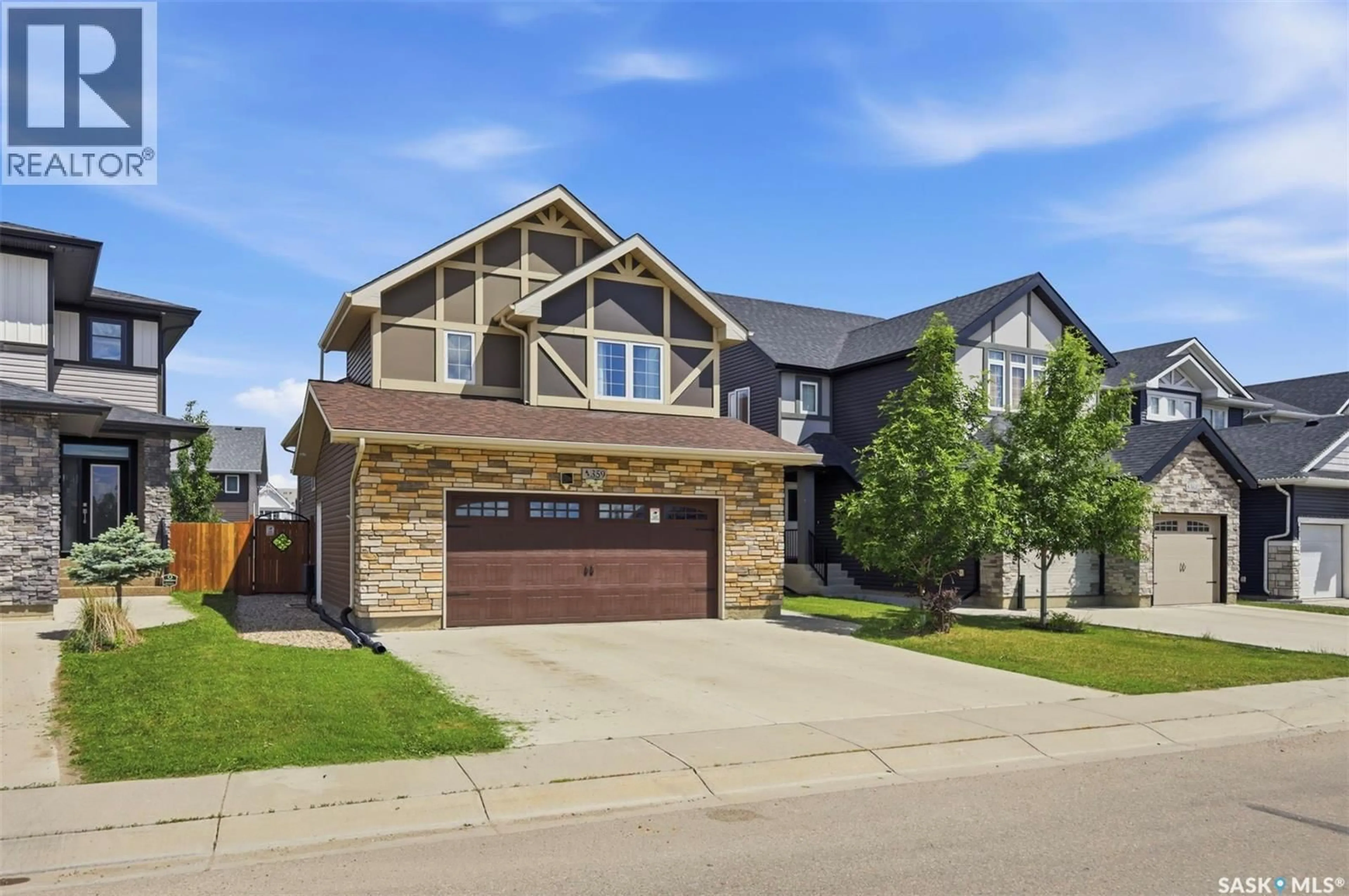 Home with brick exterior material, street for 359 UNDERHILL BEND, Saskatoon Saskatchewan S7V0N1