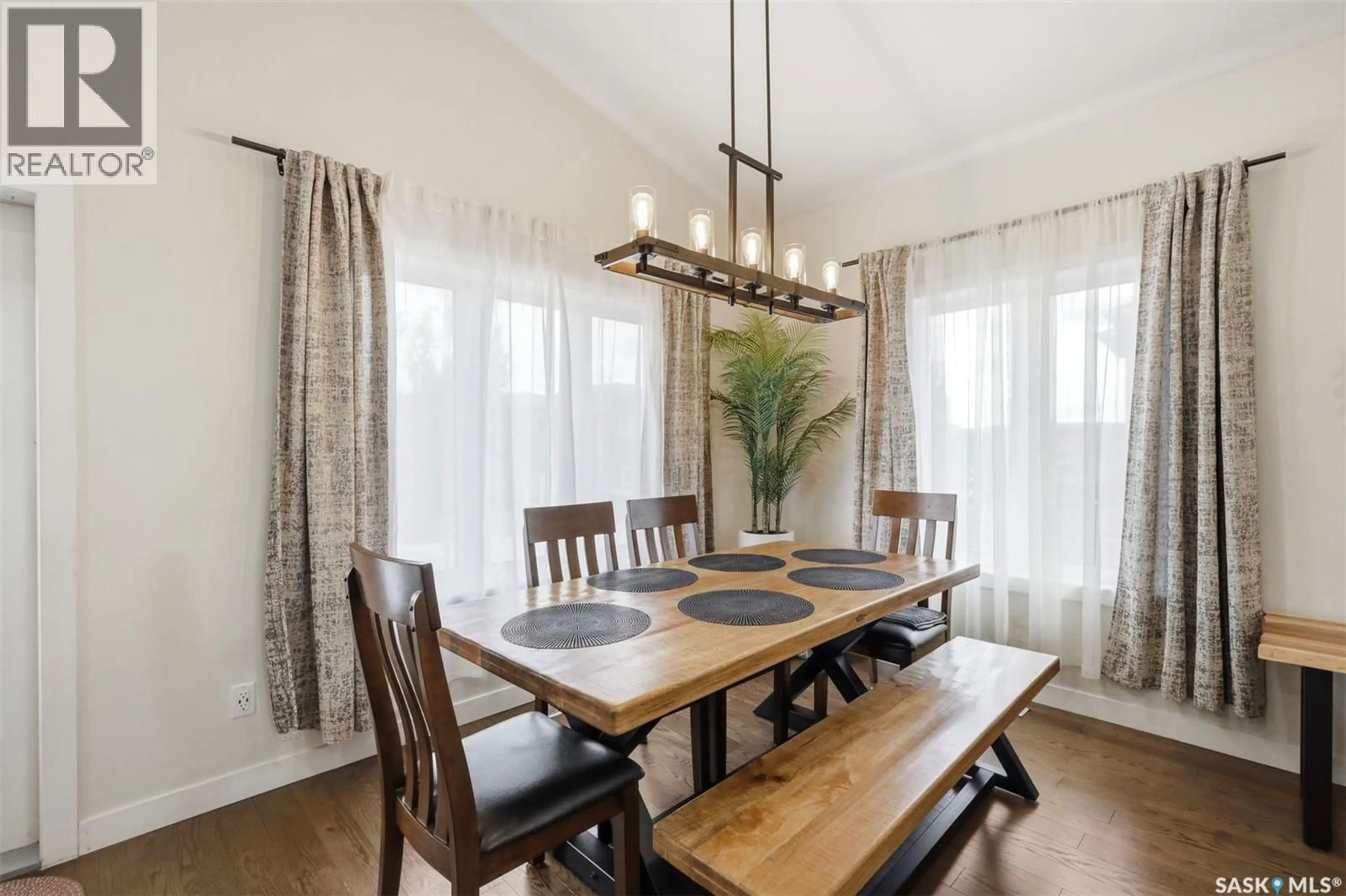 Dining room, wood/laminate floor for 359 UNDERHILL BEND, Saskatoon Saskatchewan S7V0N1