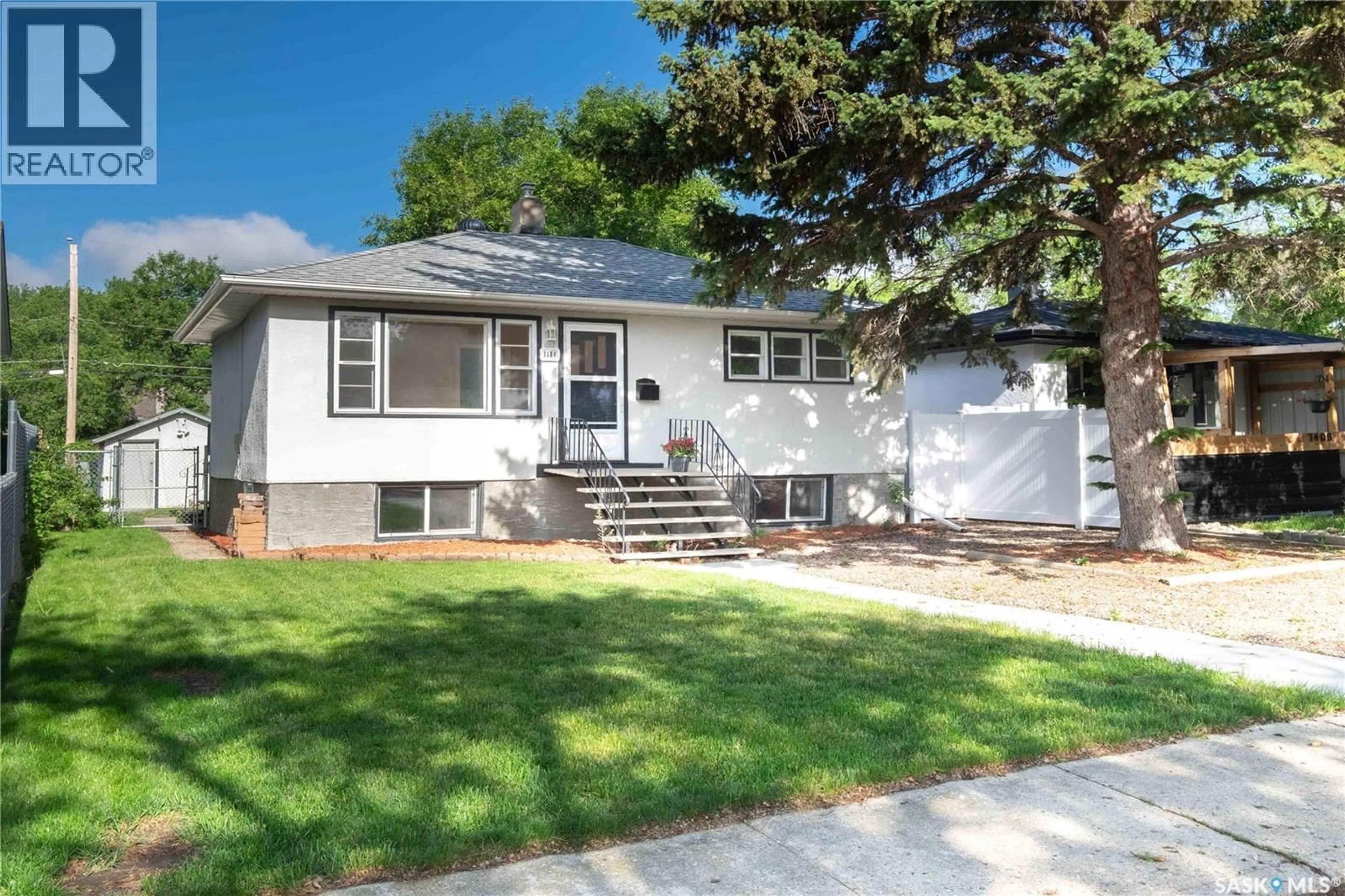 Home with vinyl exterior material, street for 1414 GREY STREET, Regina Saskatchewan S4T5H6