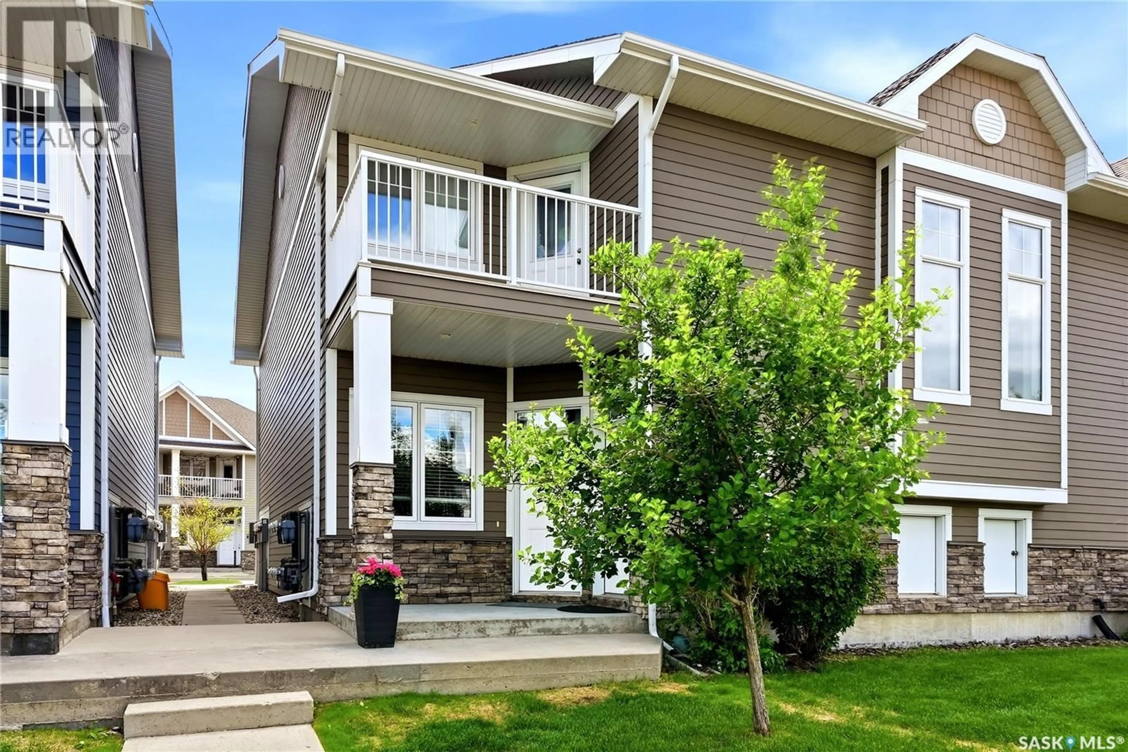 Home with vinyl exterior material, street for 4185 GREEN APPLE DRIVE, Regina Saskatchewan S4V1S1