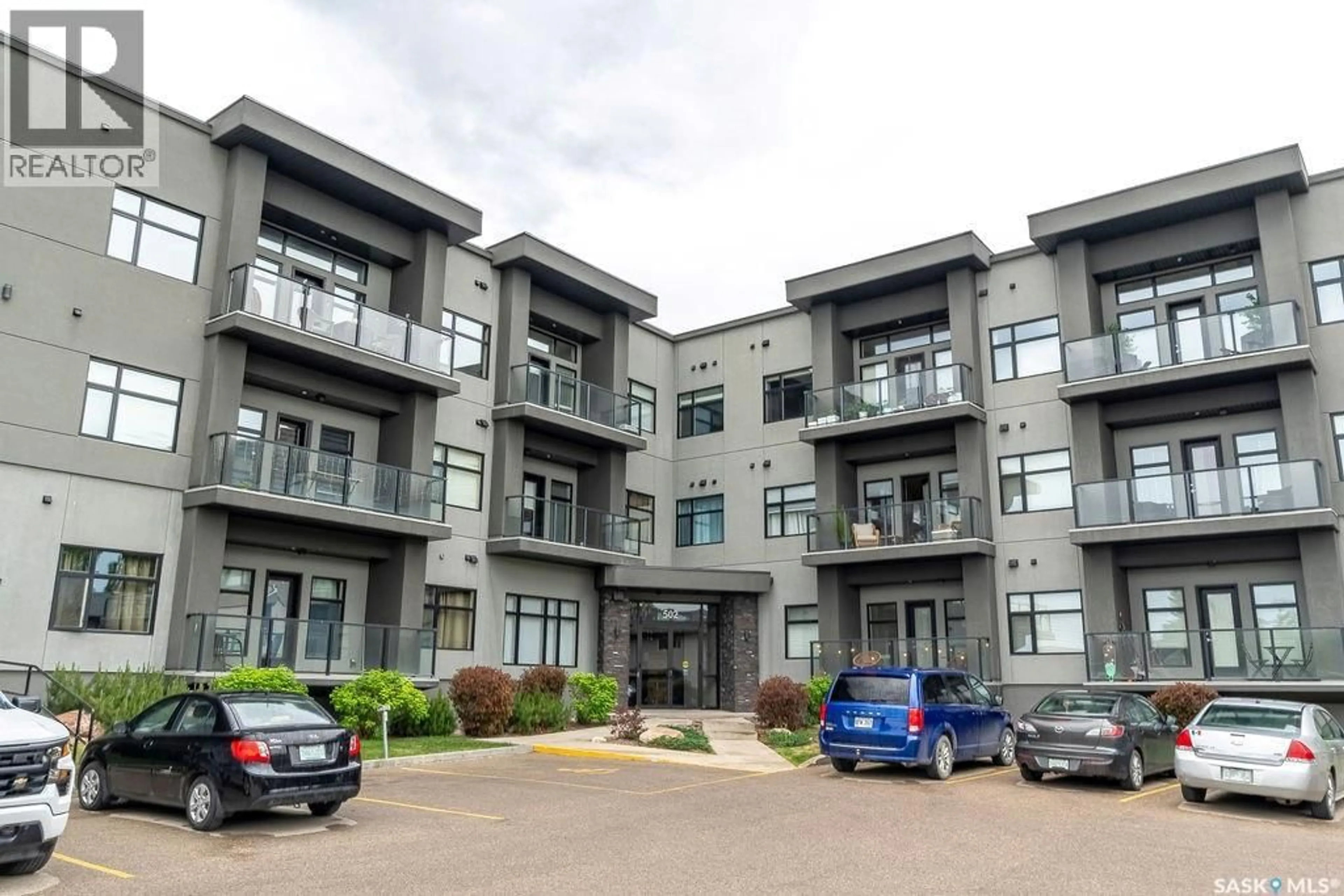 A pic from outside/outdoor area/front of a property/back of a property/a pic from drone, building for 502 - 310 PEREHUDOFF CRESCENT, Saskatoon Saskatchewan S7N0T6