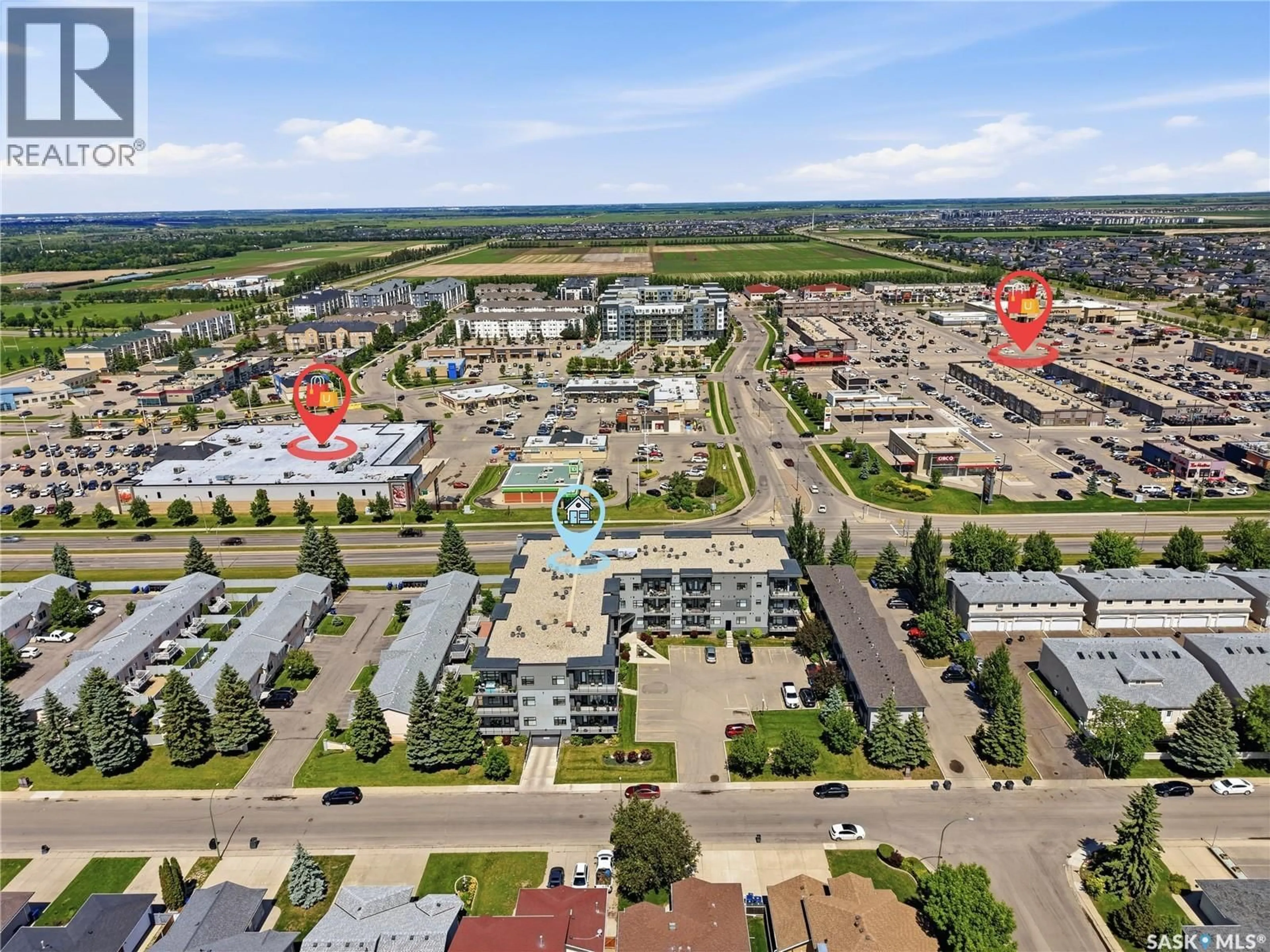 A pic from outside/outdoor area/front of a property/back of a property/a pic from drone, unknown for 502 - 311 PEREHUDOFF CRESCENT, Saskatoon Saskatchewan S7N4H6