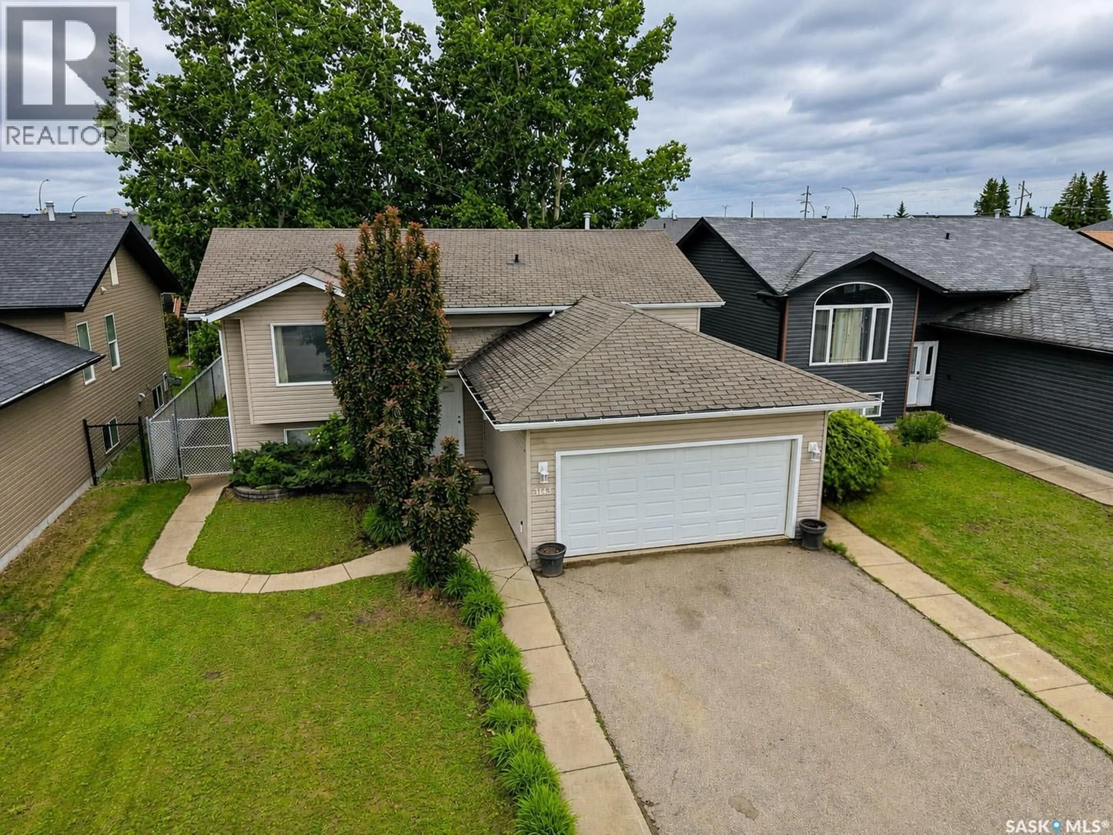 A pic from outside/outdoor area/front of a property/back of a property/a pic from drone, street for 3143 WEIR ROAD, Prince Albert Saskatchewan S6V0A5