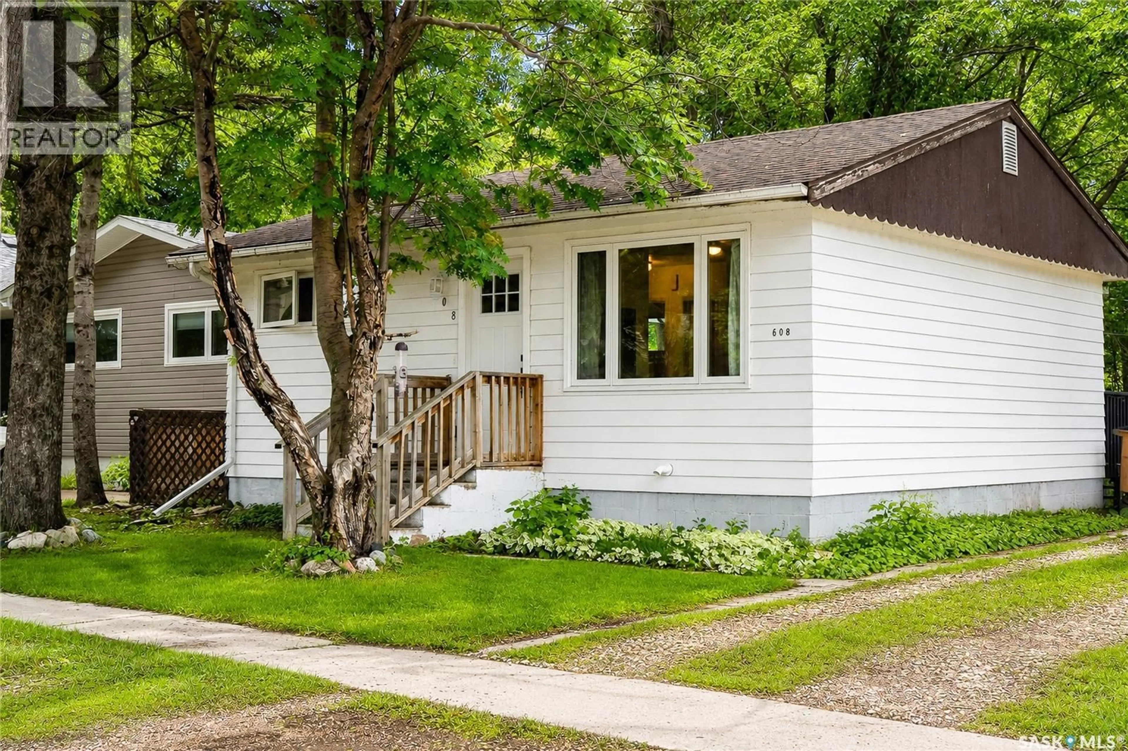 Home with vinyl exterior material, street for 608 3RD AVENUE, Cudworth Saskatchewan S0K1B0